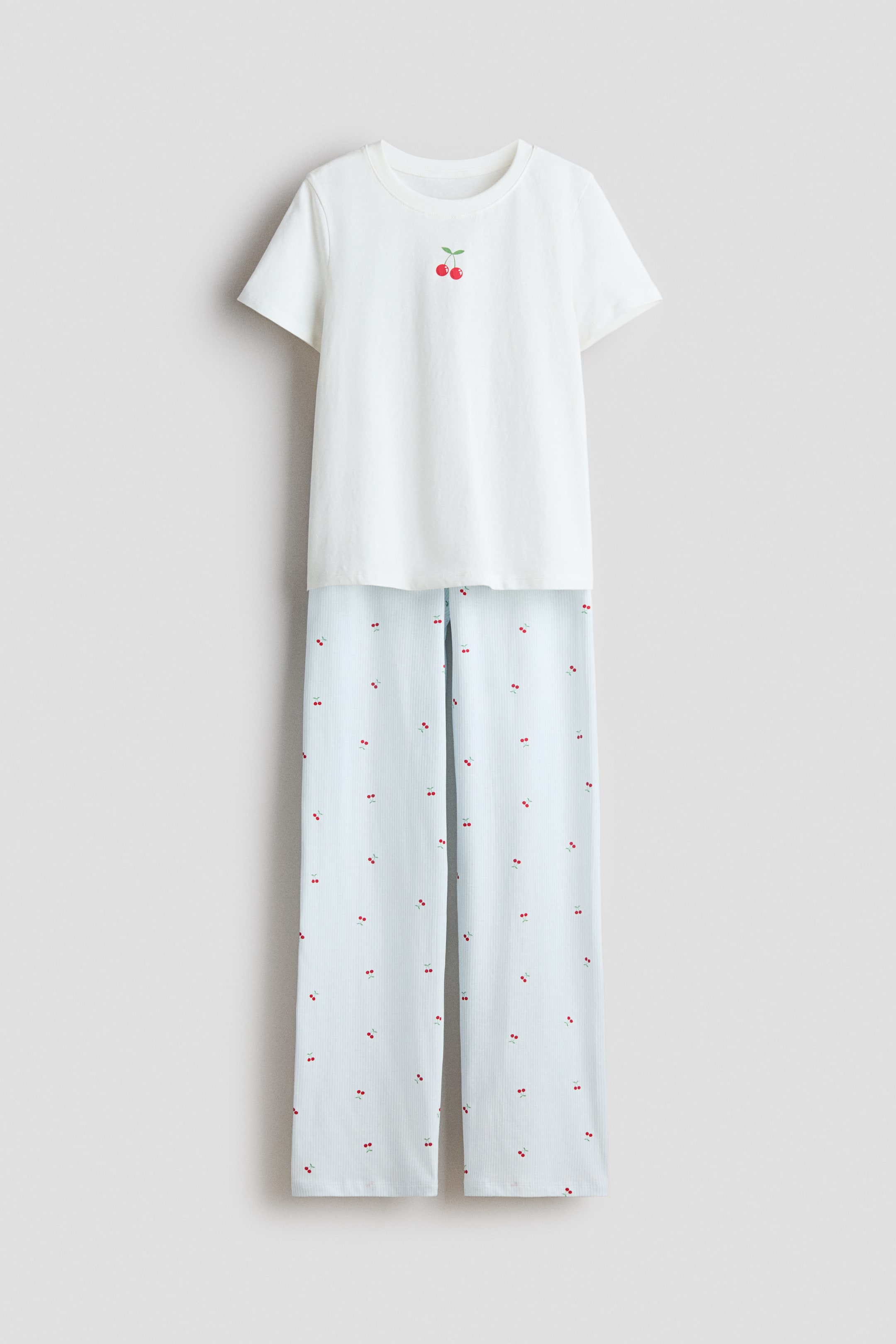 Zobacz większy obraz: Bawełniana piżama z nadrukiem - Jasnoniebieski/Wiśnie - Dziecko | H&M PL 1