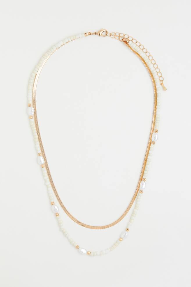 Two-strand necklace - Gold-coloured/White/Gold-coloured/Green - 1