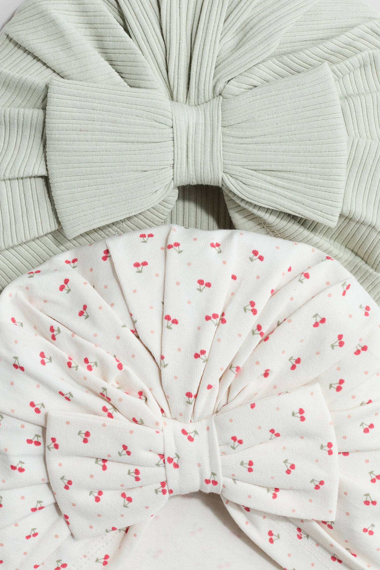 2-pack knot-detail hats - Light dusty green/Cherries/Light beige/Leopard print/Light pink/Cream/Light dusty blue/Floral/Light pink/Floral/Beige/Brown - 2