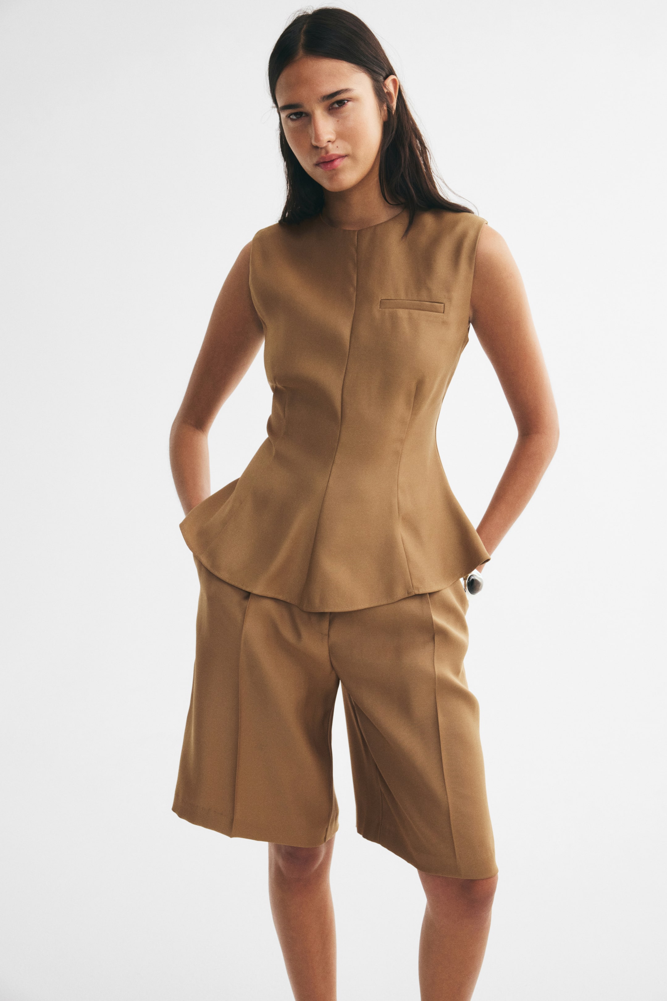 Sleeveless Peplum Top