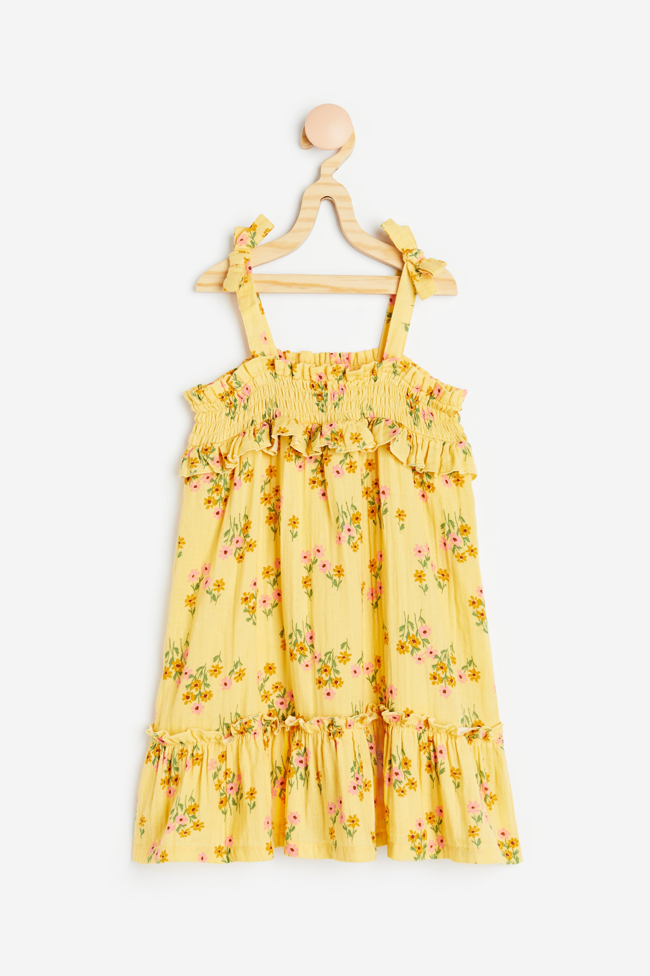 View larger image: Smocked cotton dress - Light yellow/Floral - Kids | H&M HK 1