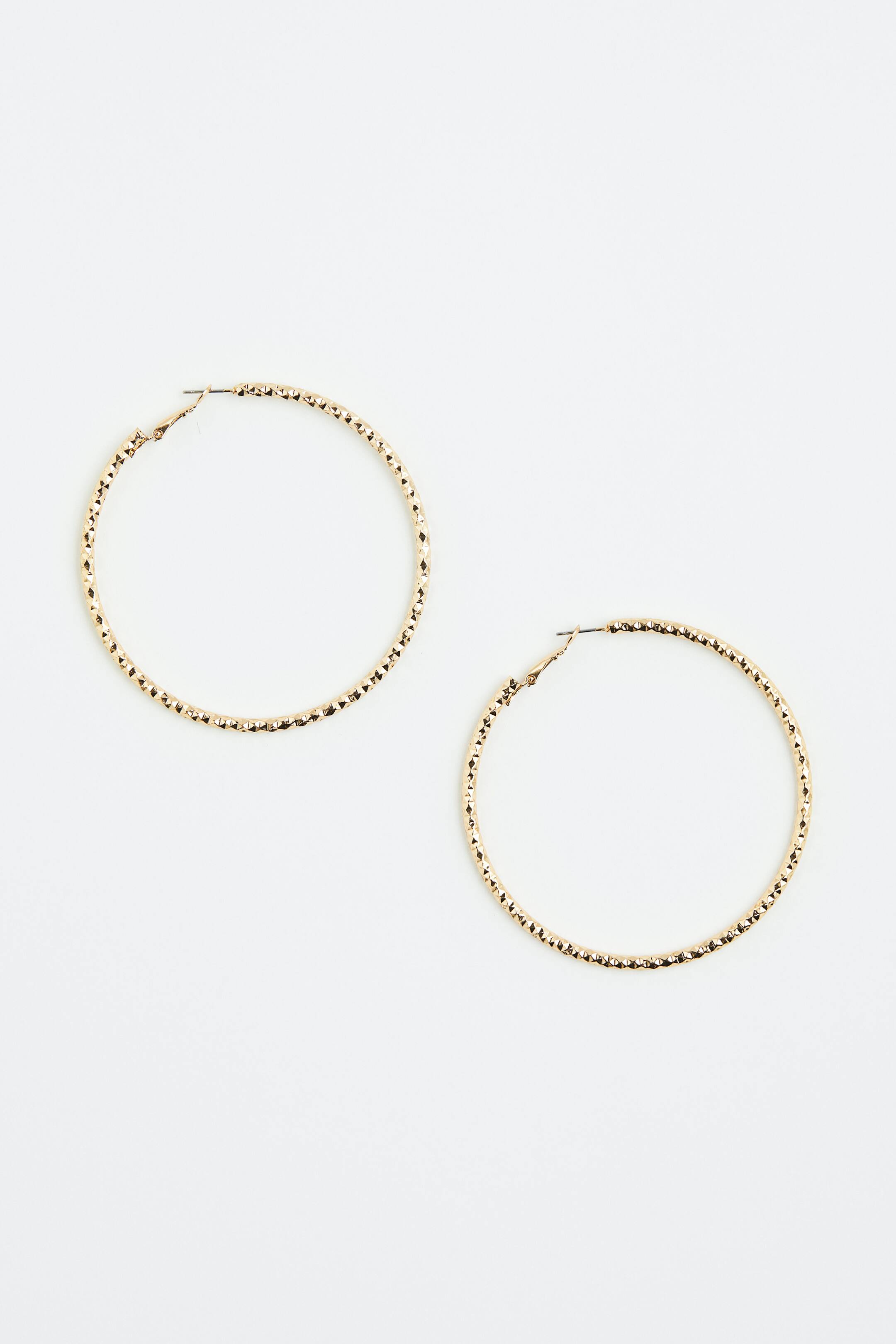 View larger image: Textured hoop earrings - Gold-coloured - Ladies | H&M 1