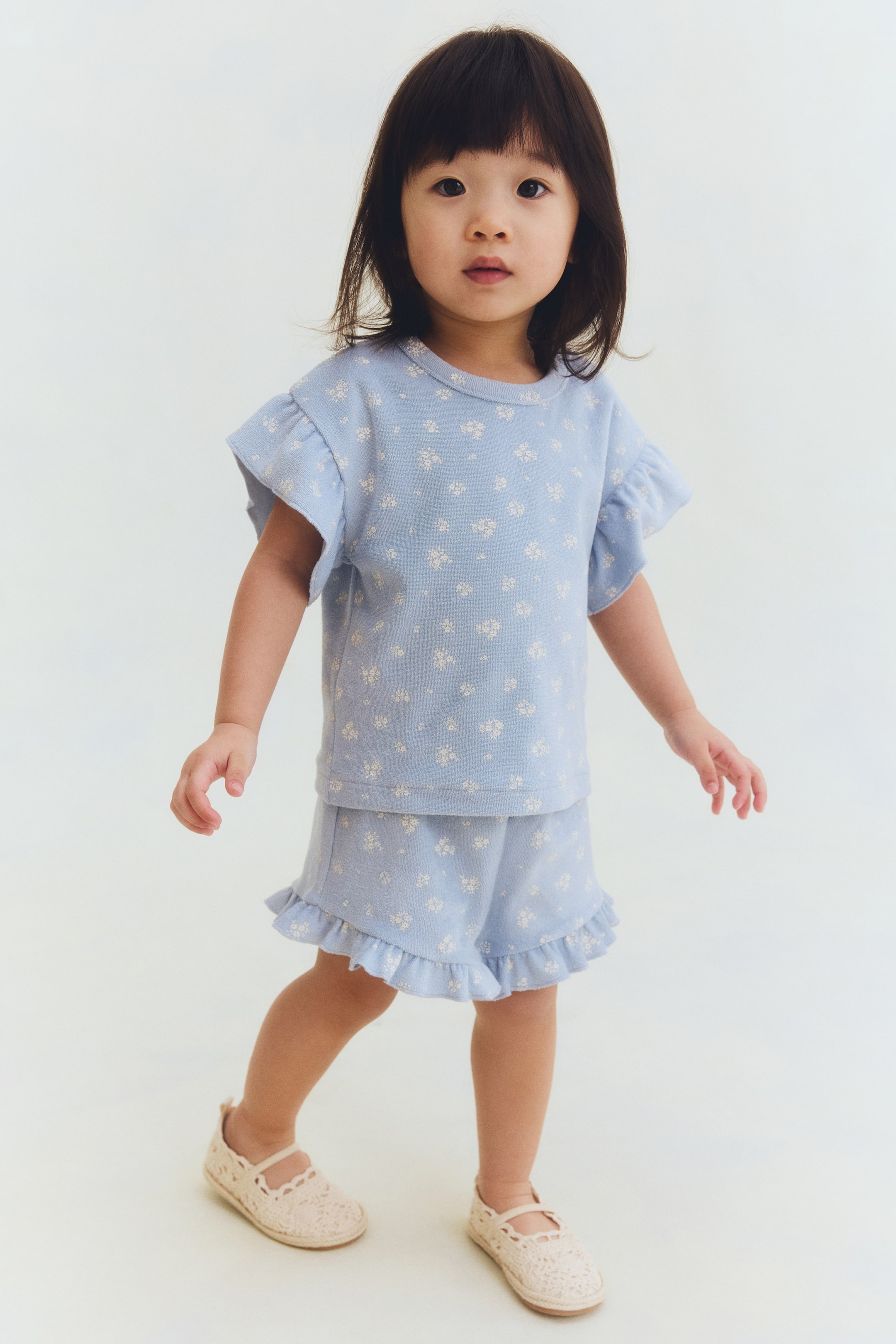 View larger image: 2-piece printed terry set - Light blue/Floral - Kids | H&M 1