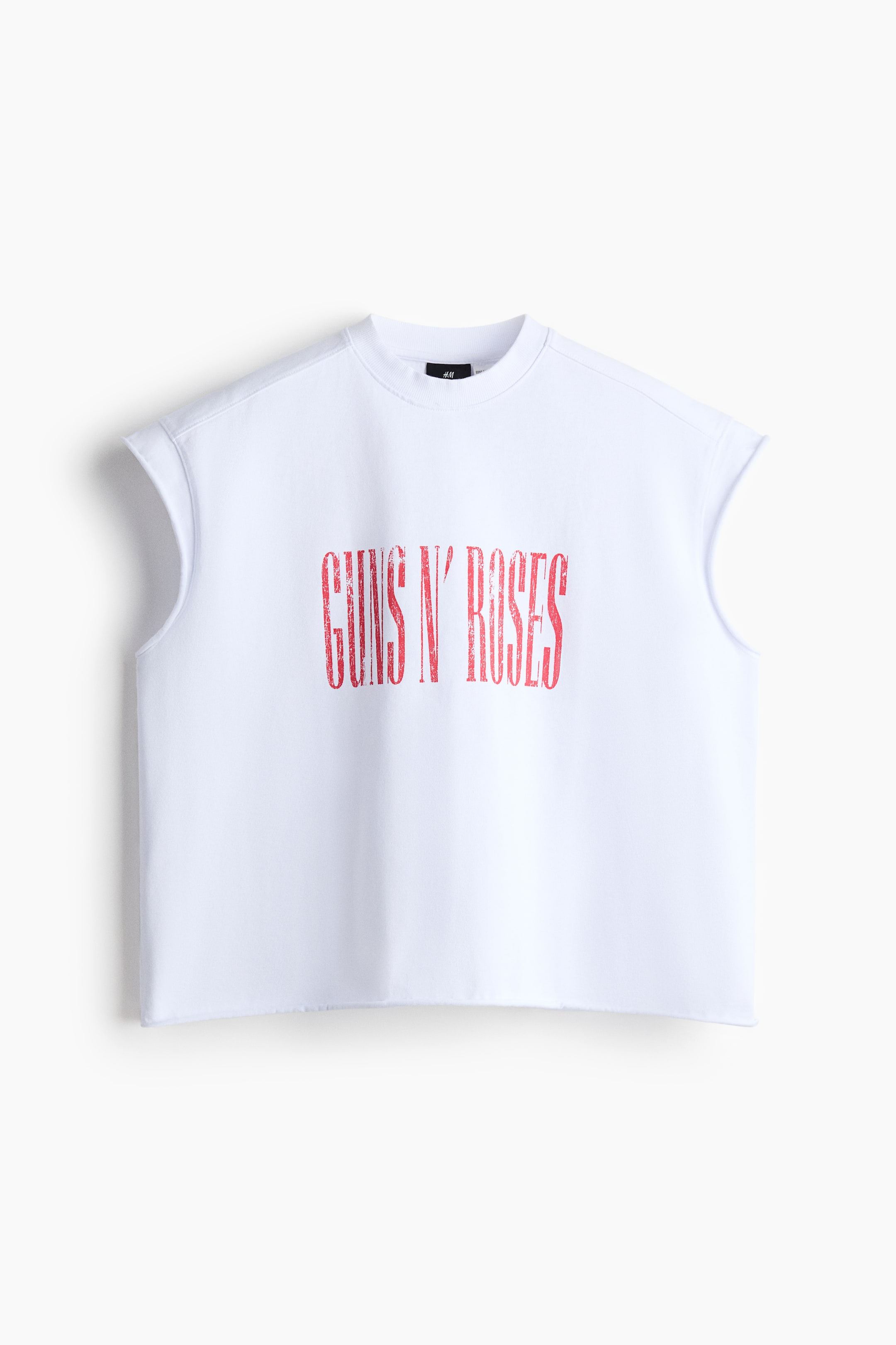 View larger image: A white sleeveless crew neck top showcasing a distressed red "GUNS N' ROSES" text print on the front. It features raw edge armholes and a raw edge bottom hem.