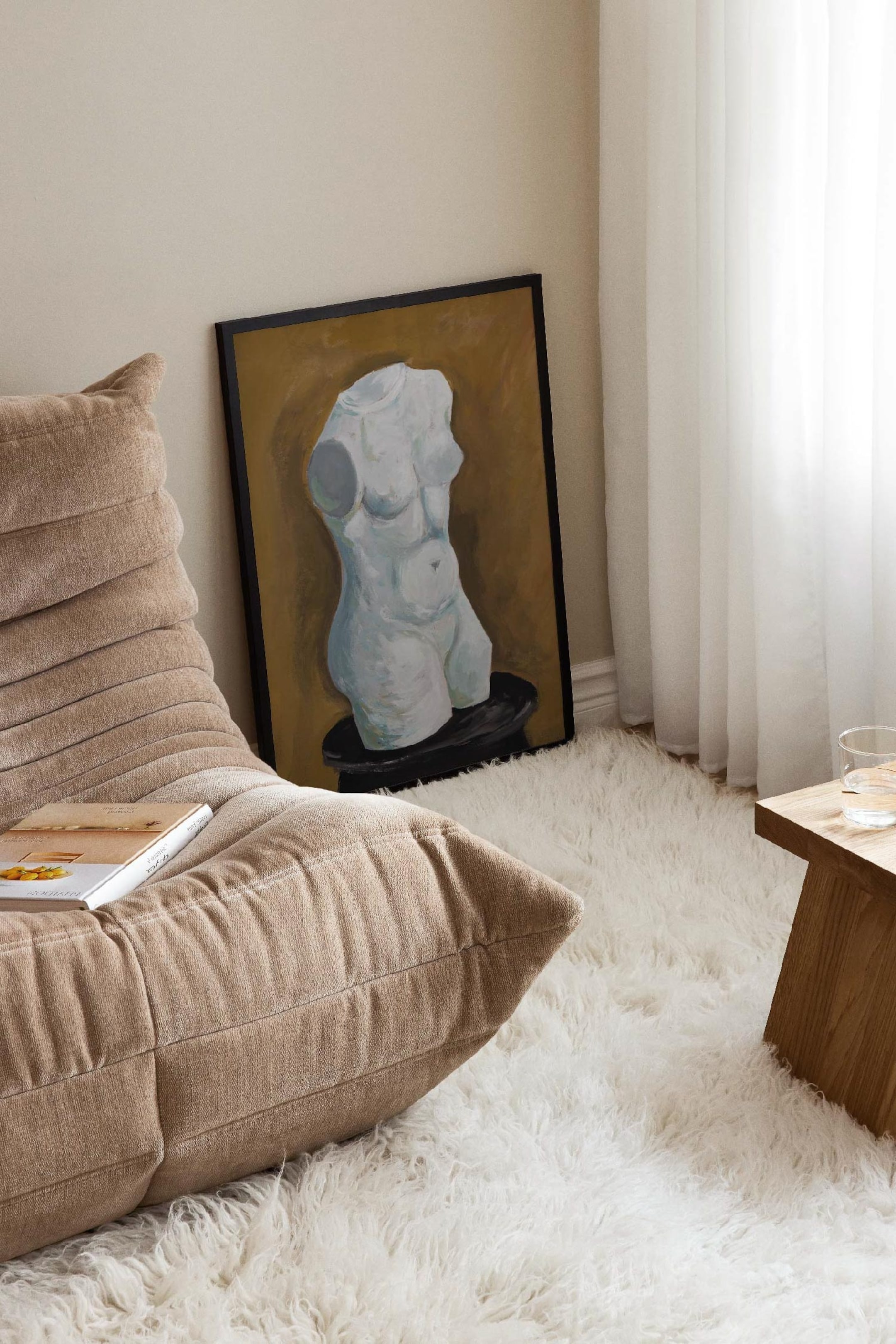 View larger image: The framed painting depicts a white classical-style torso, facing slightly to the right and resting on a dark base, against a gold-toned background.
