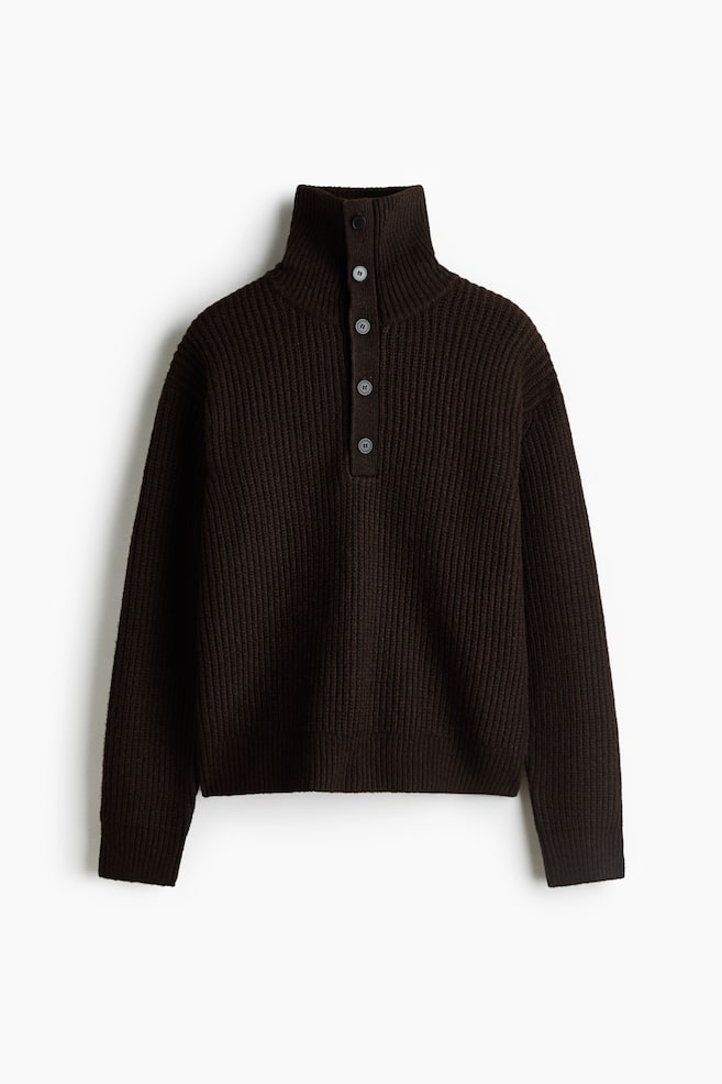 A dark brown ribbed-knit sweater is facing front, featuring a high collar with a five-button placket. The sweater is displaying a relaxed fit with long sleeves, ribbed cuffs, and a ribbed hem. - 1