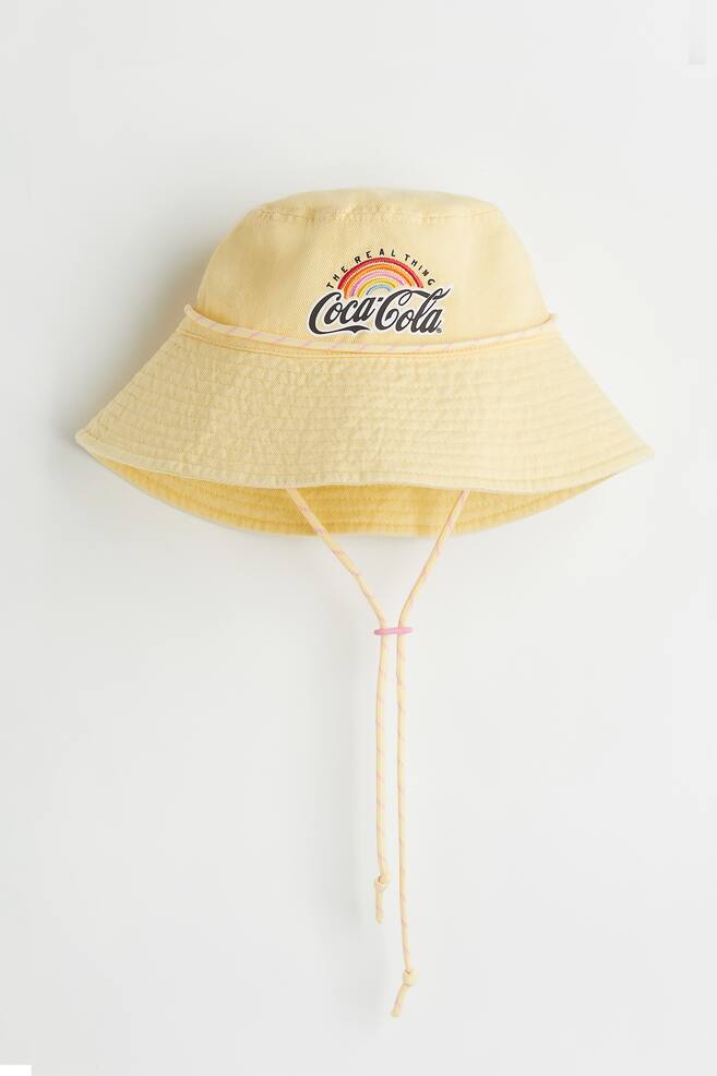 Chin-strap bucket hat - Light yellow/Coca-Cola - 1