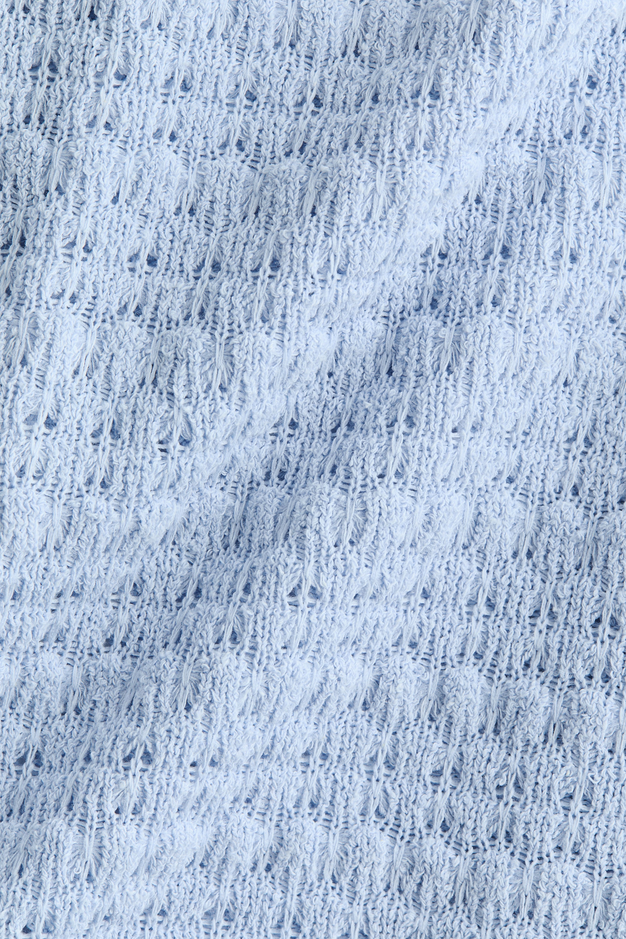 Haut cape en tricot texturé