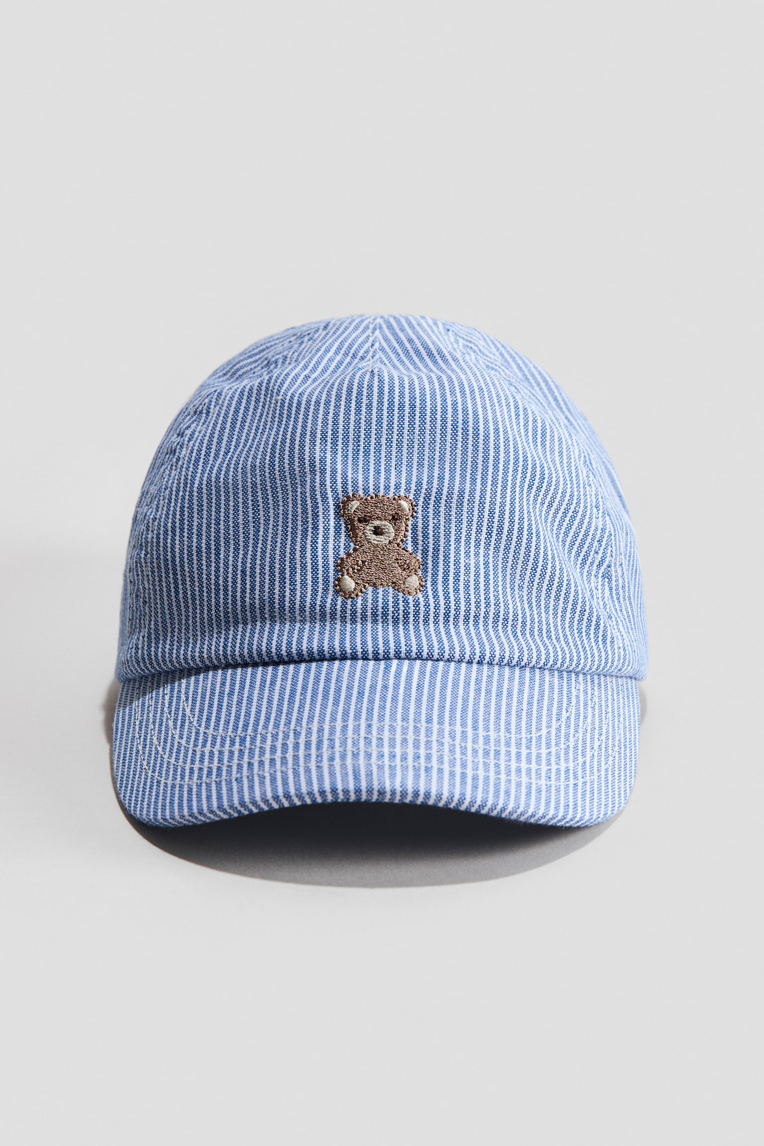 Cotton cap - Light blue/Teddy bear/Light beige/Vehicles/Light green/Happy/Mole/Dinosaurs/Light pink/Little Dreamer/Dark grey/Mini Adventurer/Brown/Happy/Dark denim blue/Beige/Dogs/Dark grey/Red/New York City/Dark mole/New Discoveries/Light green/Mini Adventurer/Denim blue - 1