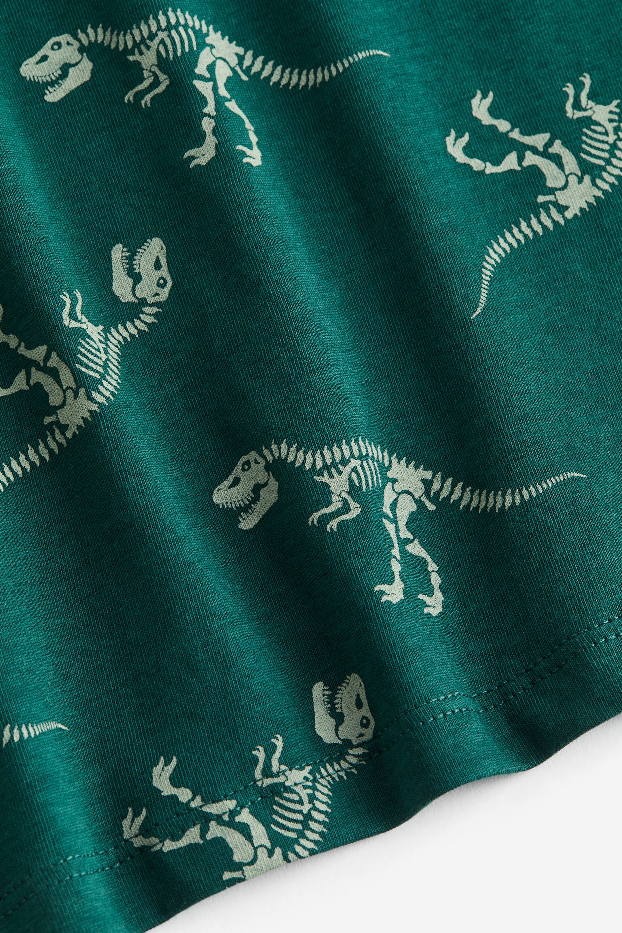 View larger image: Cotton jersey T-shirt - Dark green/dinosaur skeletons - Kids | H&M PH 2