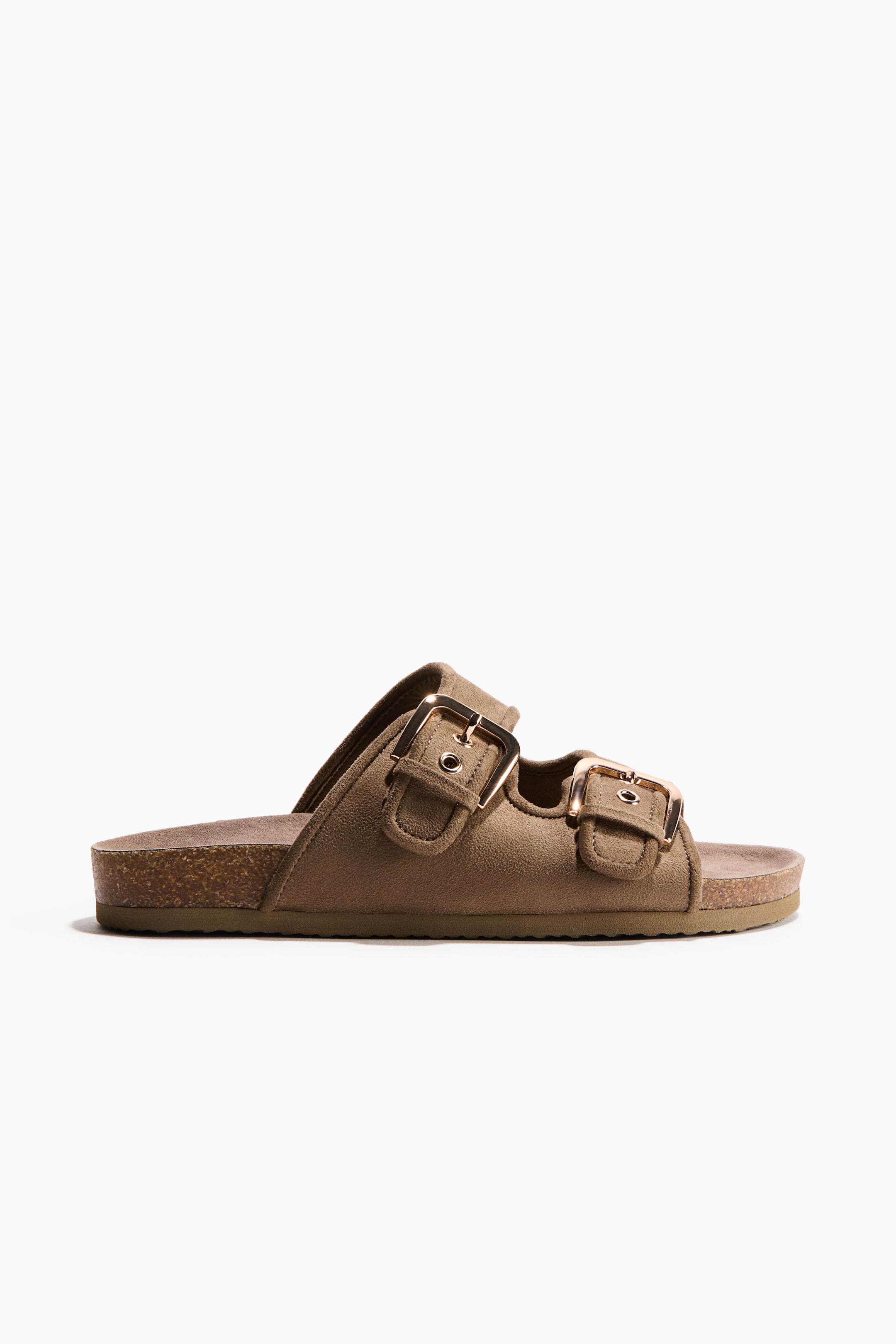 View larger image: The sandals showcase two broad, adjustable foot straps, each fastened with a gold-toned metal buckle. They come with a moulded insole and a visible cork-like midsole, complemented by a subtly patterned outsole.