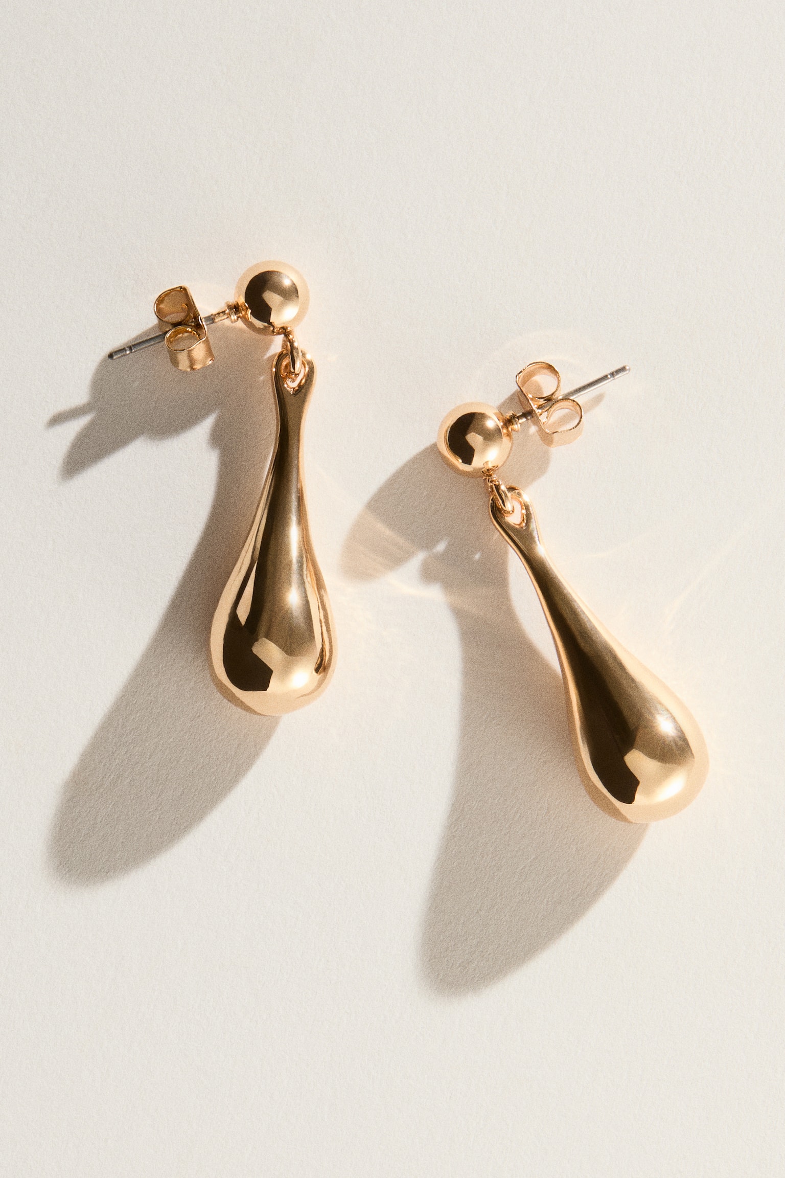 Drop-shaped pendant earrings - Gold-coloured - 1