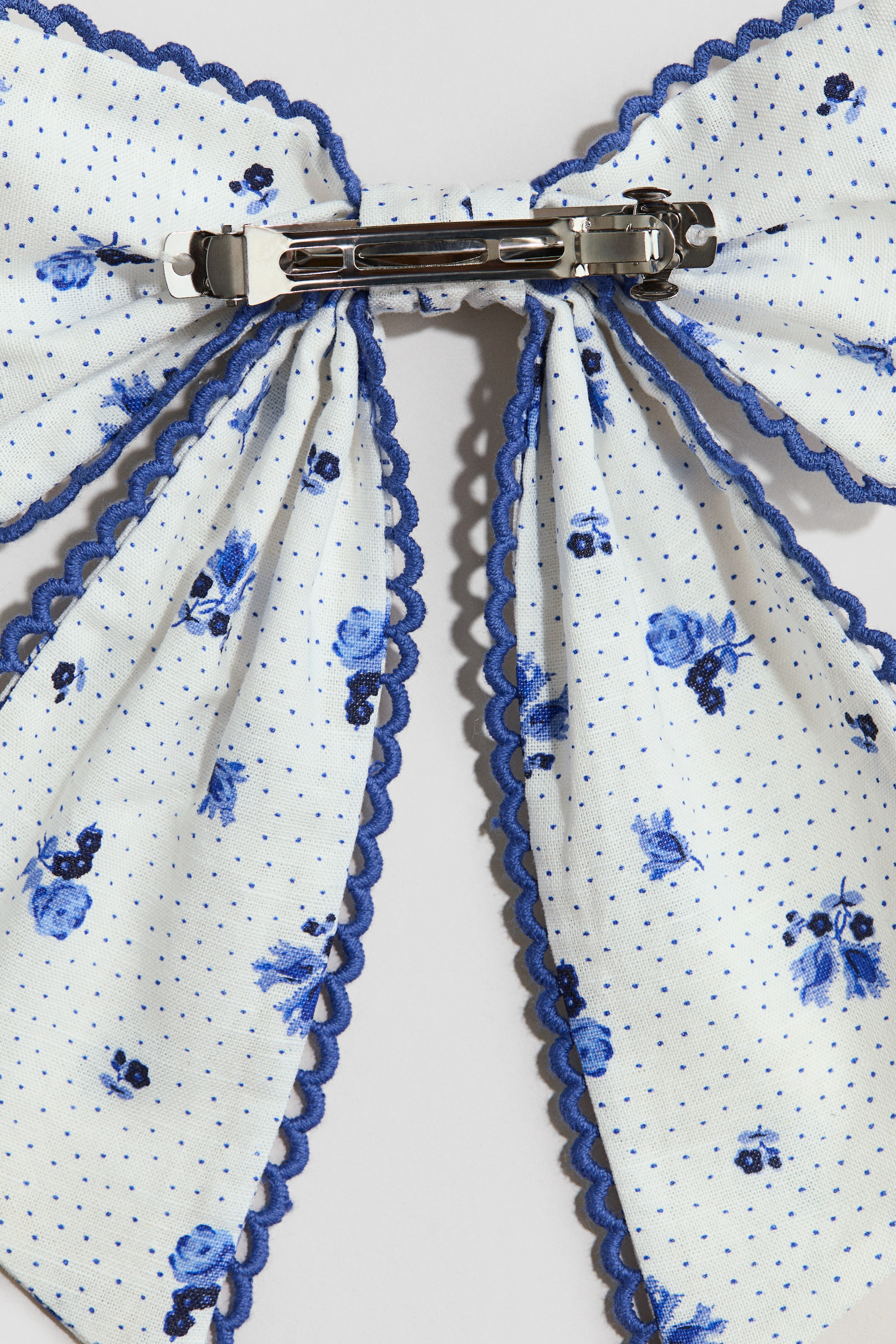 Barrette avec boucles à motif