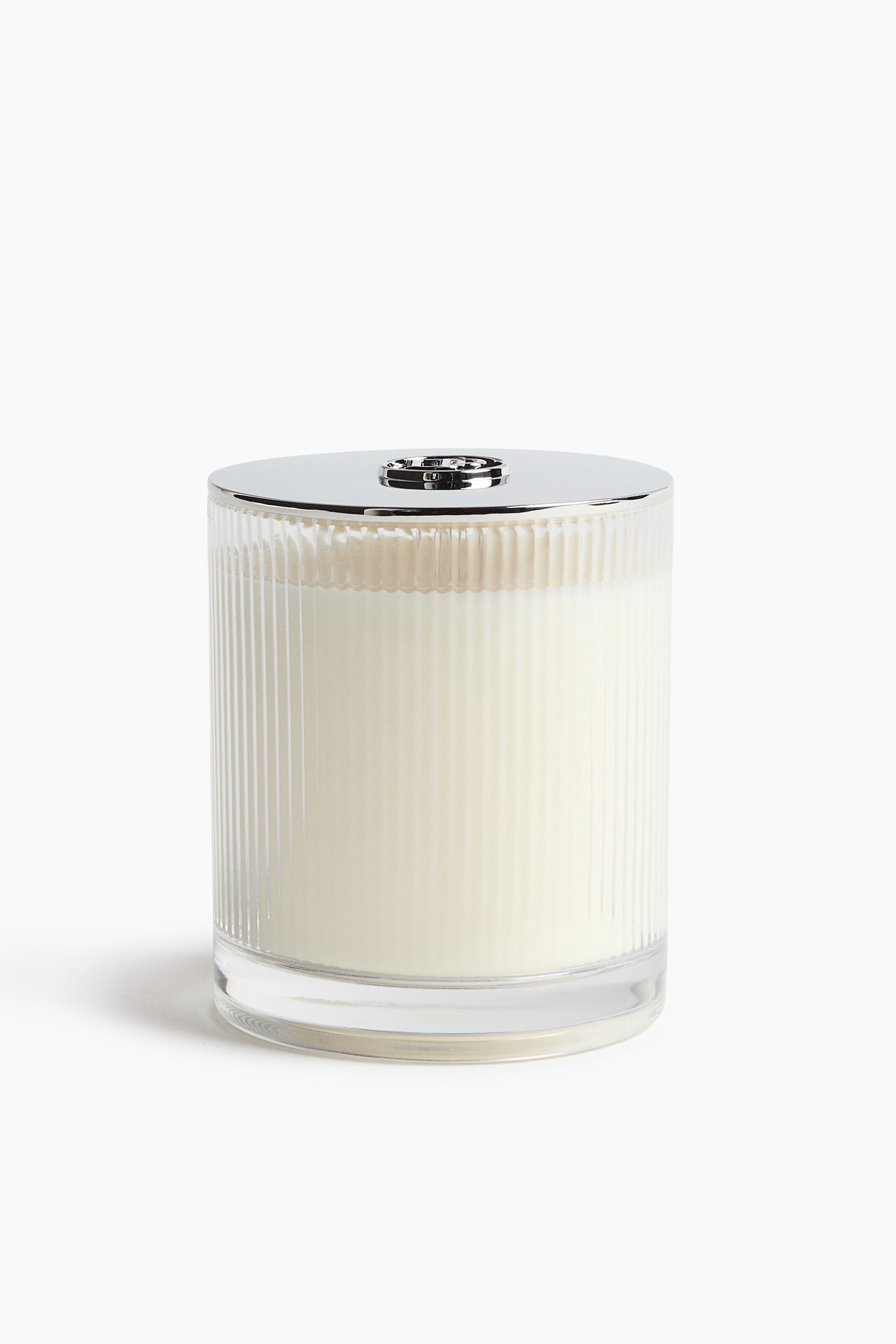 Bougie parfumée dans un pot en verre rainuré