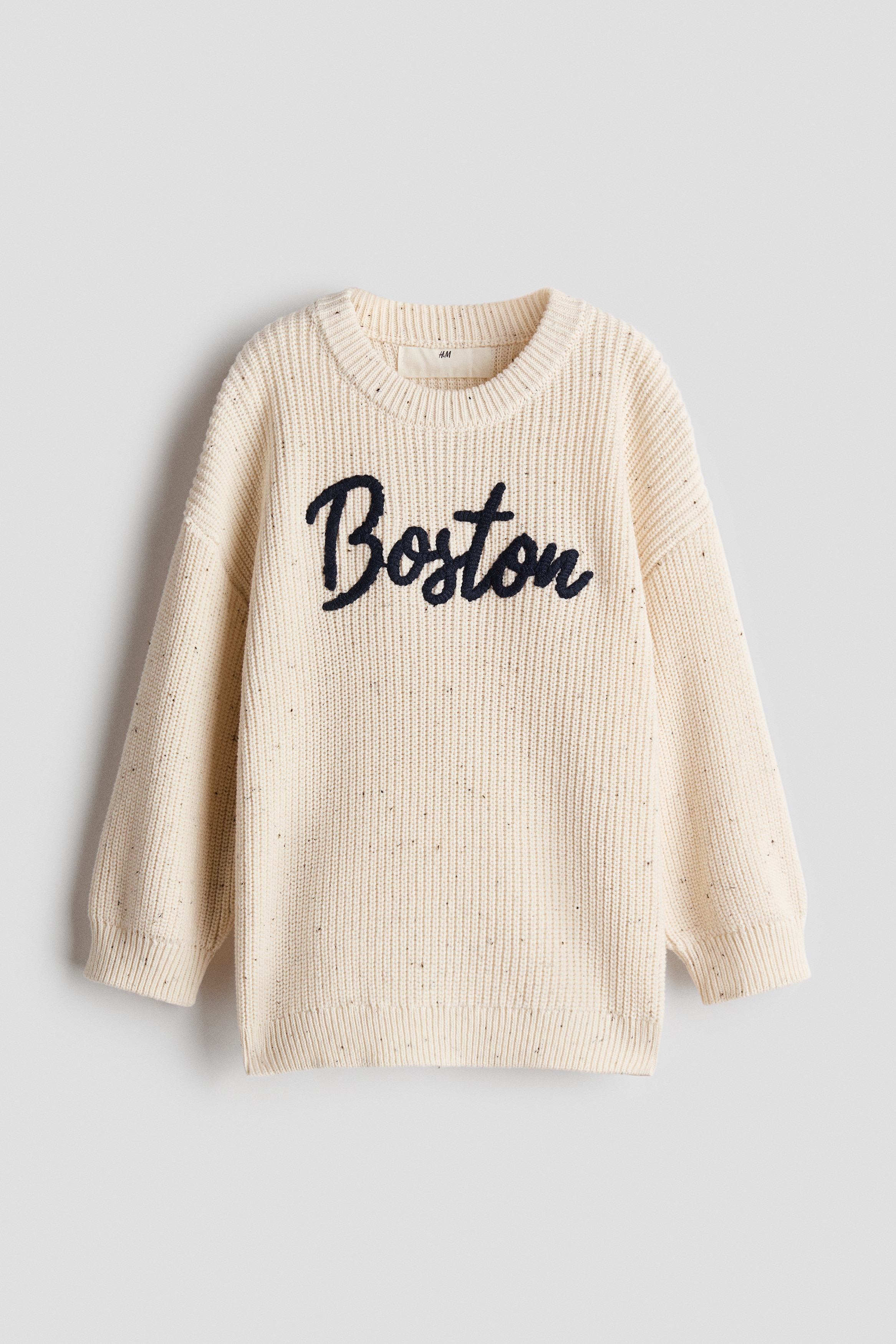 Loose-fit text-motif jumperModel