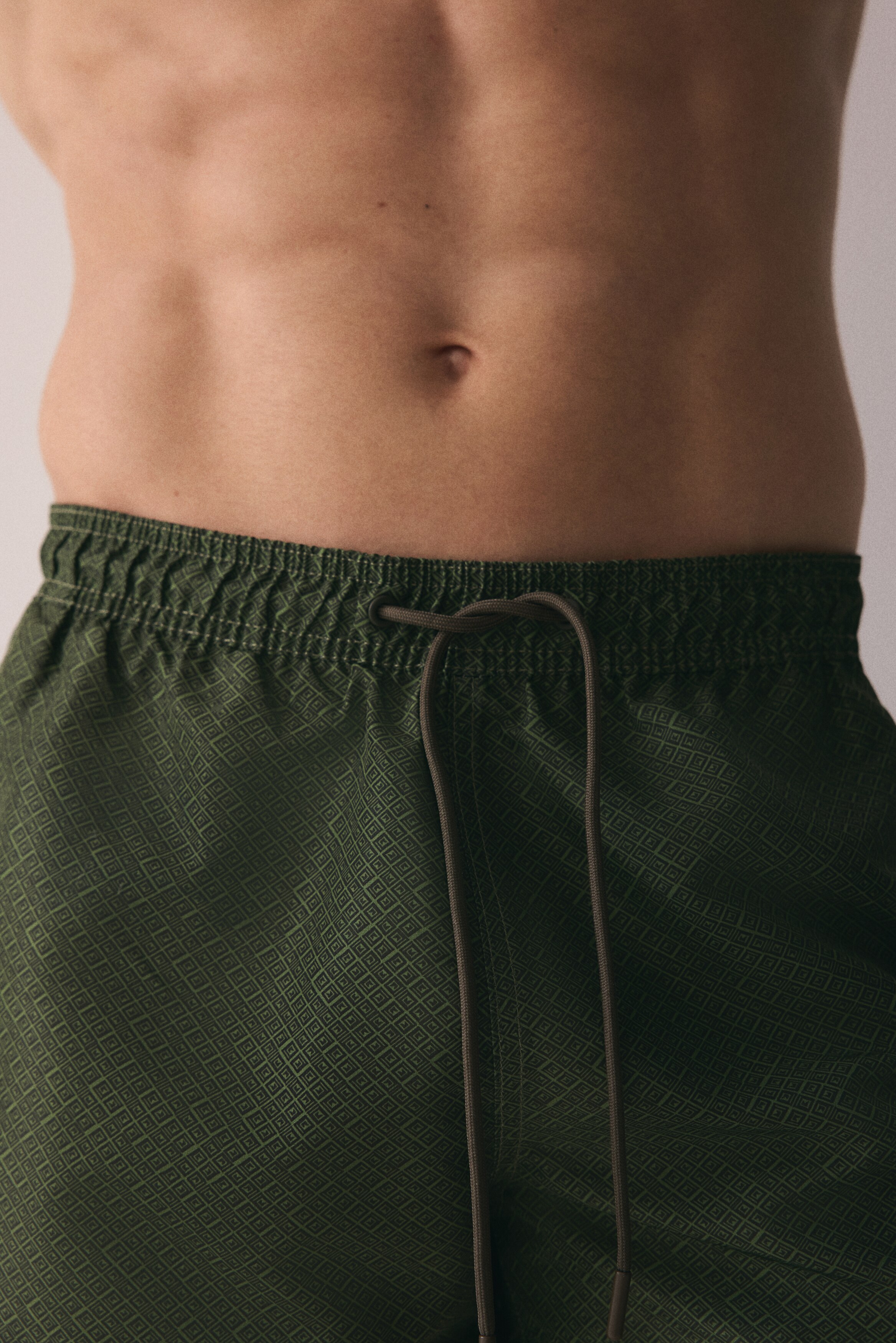 Patterned swim shorts