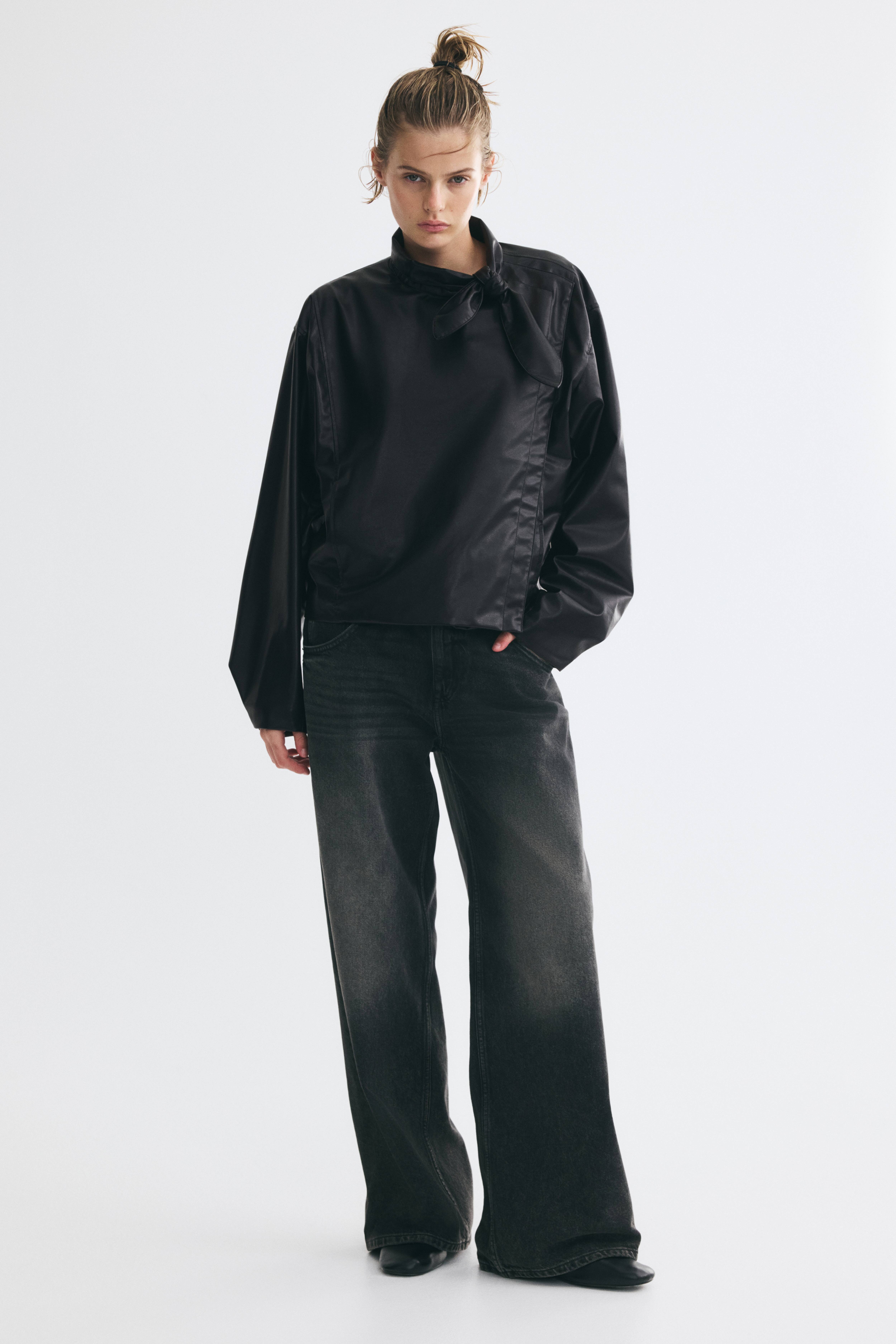Veste en tissu enduit avec col à nouer