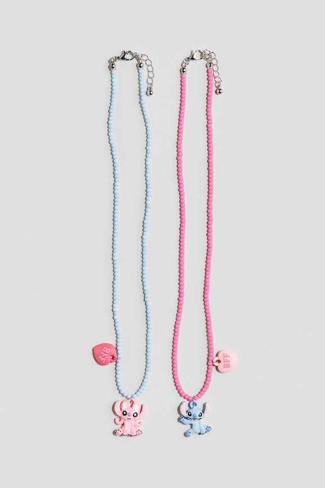 Set van 2 kralenkettingen met hangertjes - Roze/Lilo & Stitch - 1