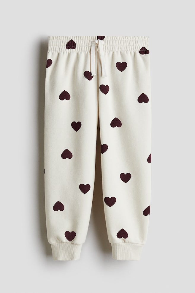 Brushed-inside joggers - White/Hearts/Pink/Light beige/White/Hearts/Heather purple/Hearts/Bright pink/Dark grey/Hearts/White/Hearts - 1