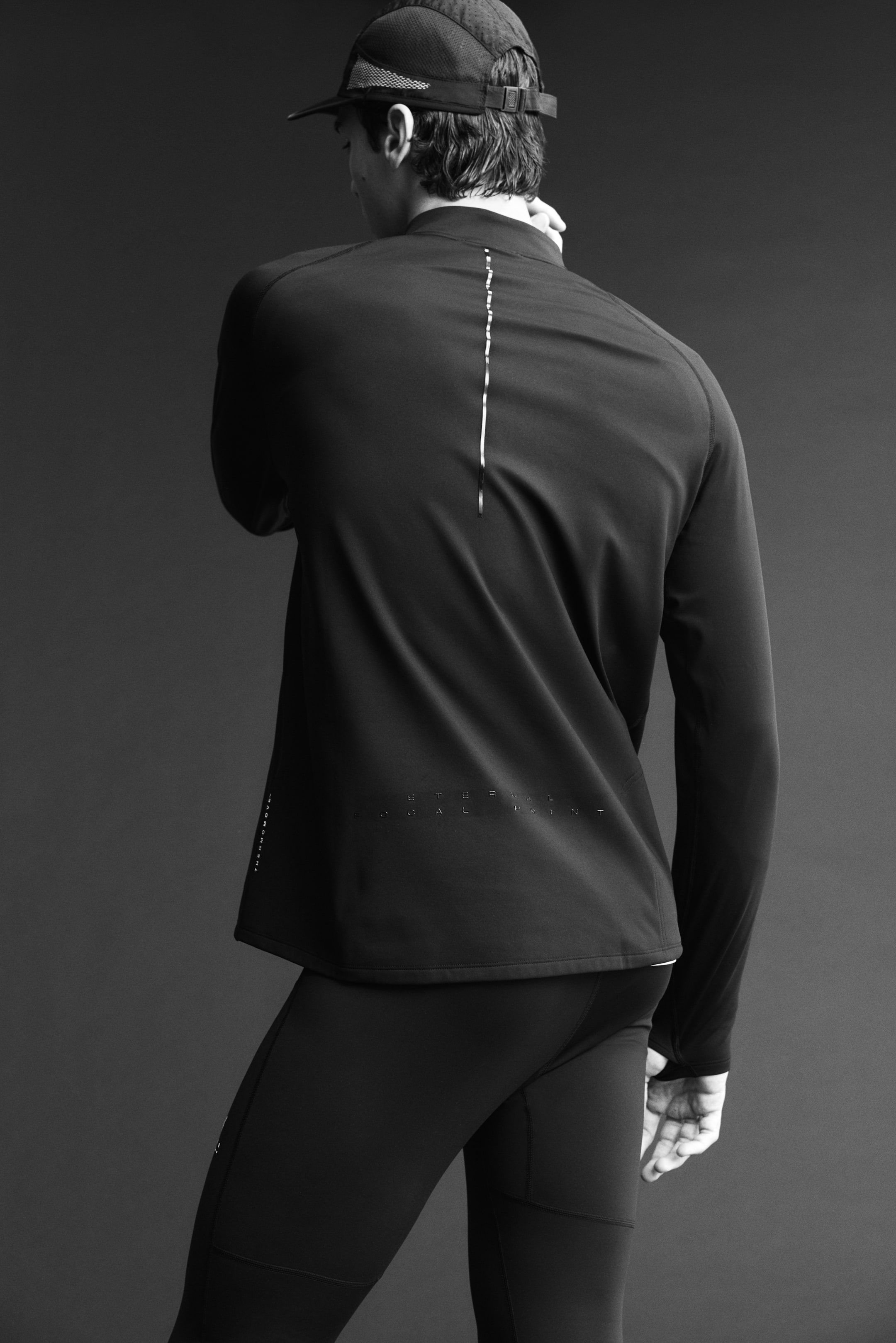 View larger image: Warming zip-top sports top with ThermoMove™ - Black/Move Zlatan - Men | H&M IN 4