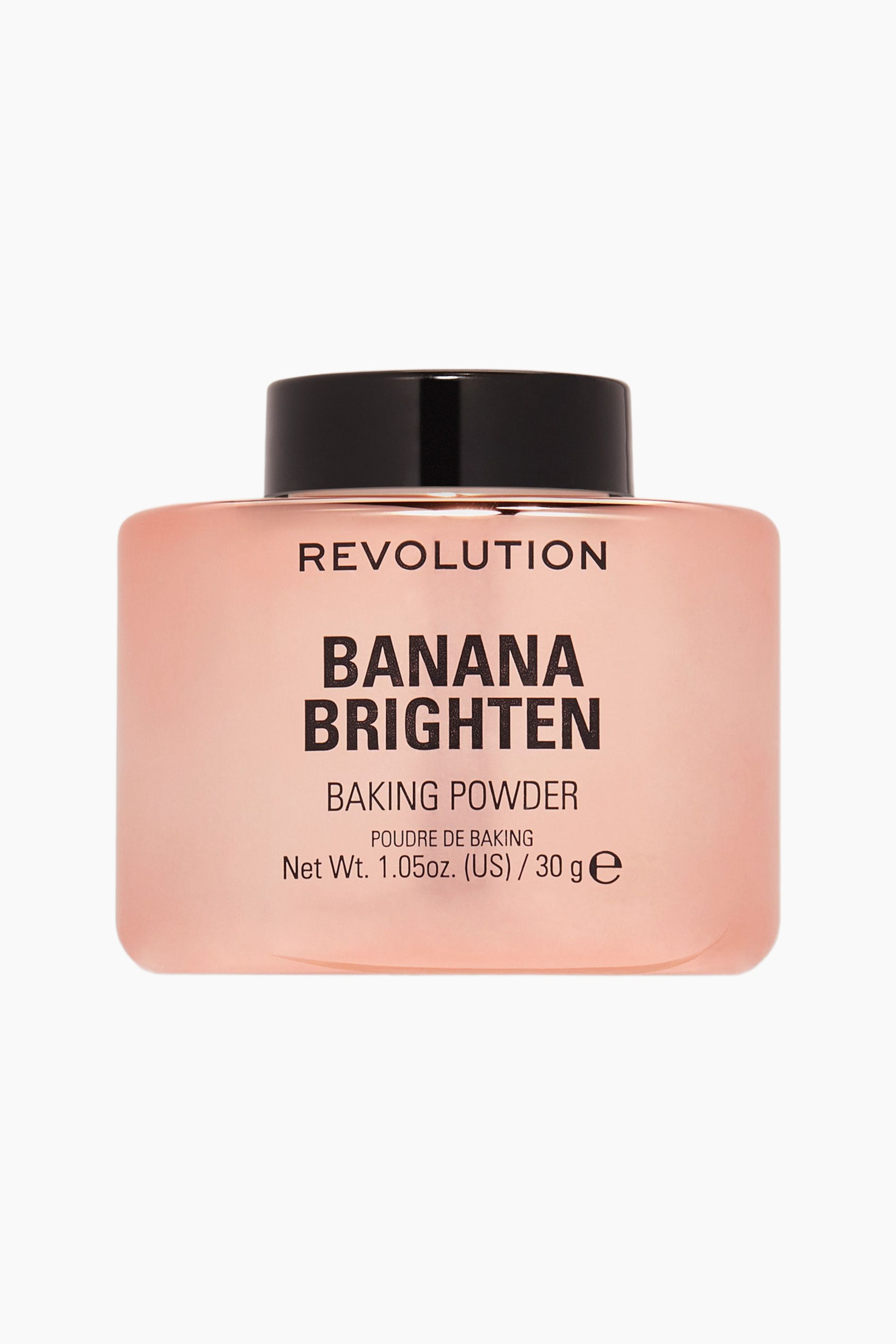 Visa större bild: Detta Revolution Banana Brighten Baking Powder visas framifrån och har en halvtransparent persikotonad burk med rundade hörn och ett glansigt svart lock. Framsidan av behållaren visar svart tryckt text med varumärket "REVOLUTION" och produktnamnet "BANANA BRIGHTEN BAKING POWDER".