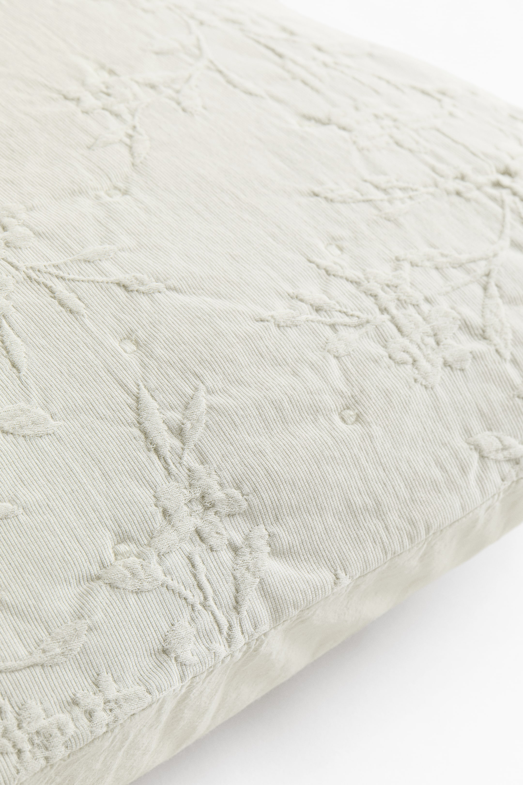 Housse de coussin en tissu jacquard