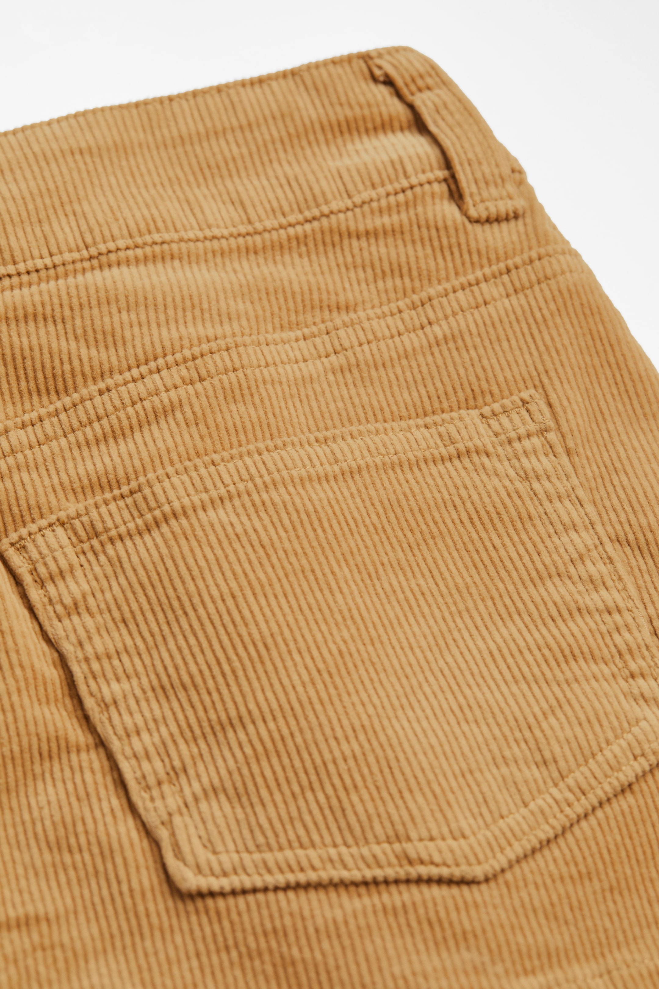 Mini skirt - Low waist - Short - Light beige - Ladies | H&M GB