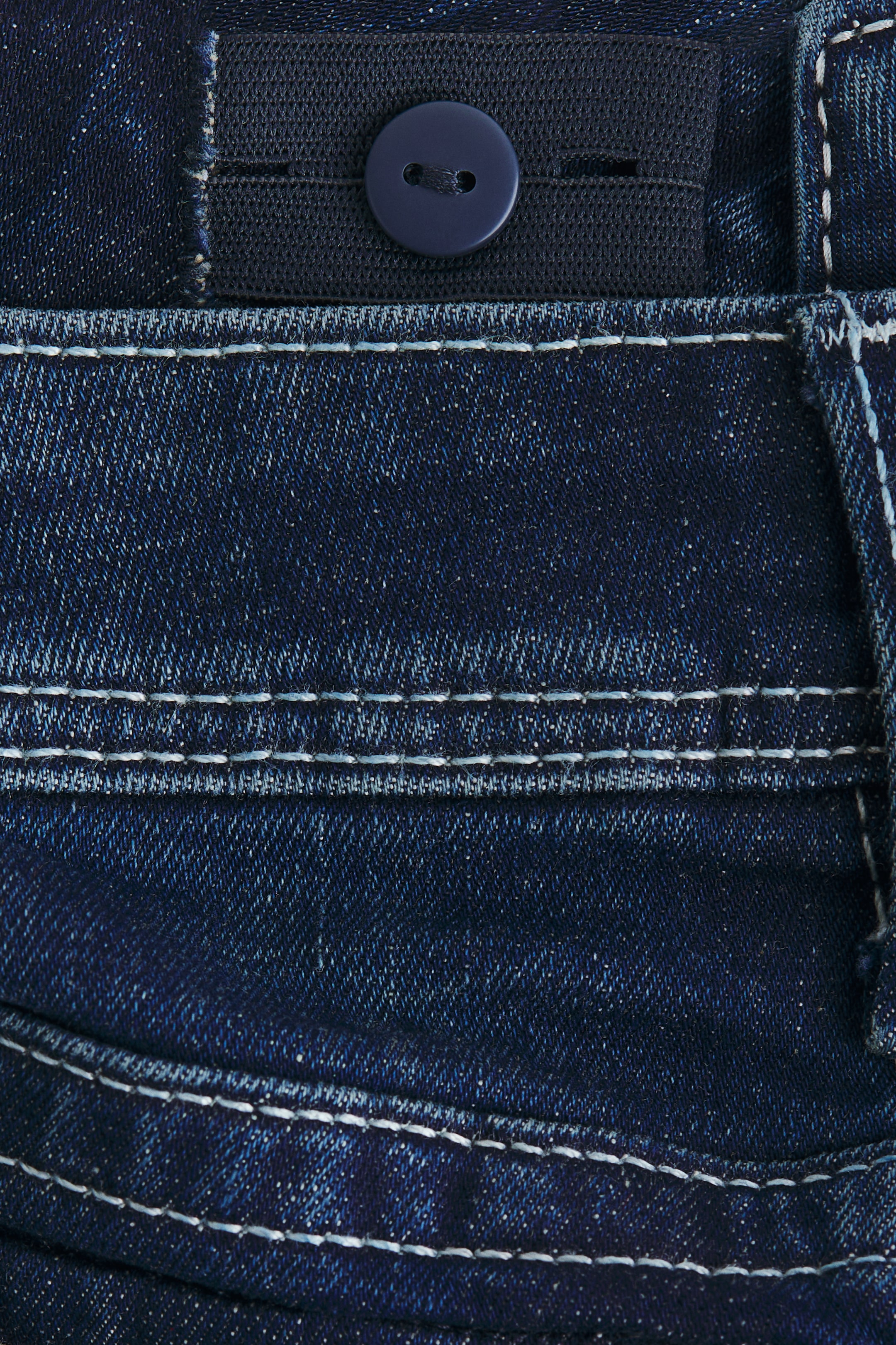 Embroidered-Detail Flared Low Jeans