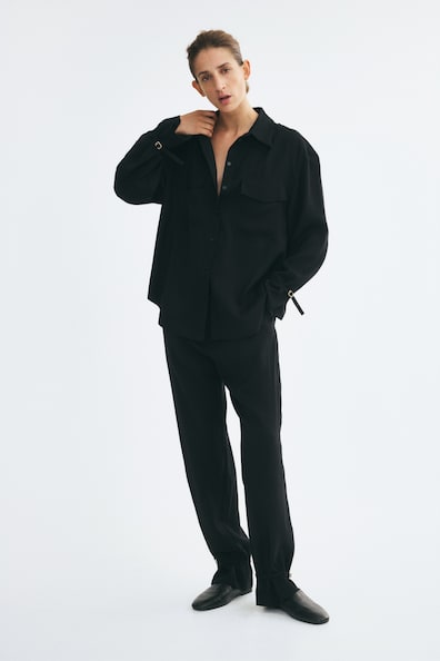 Strap-detail trousers