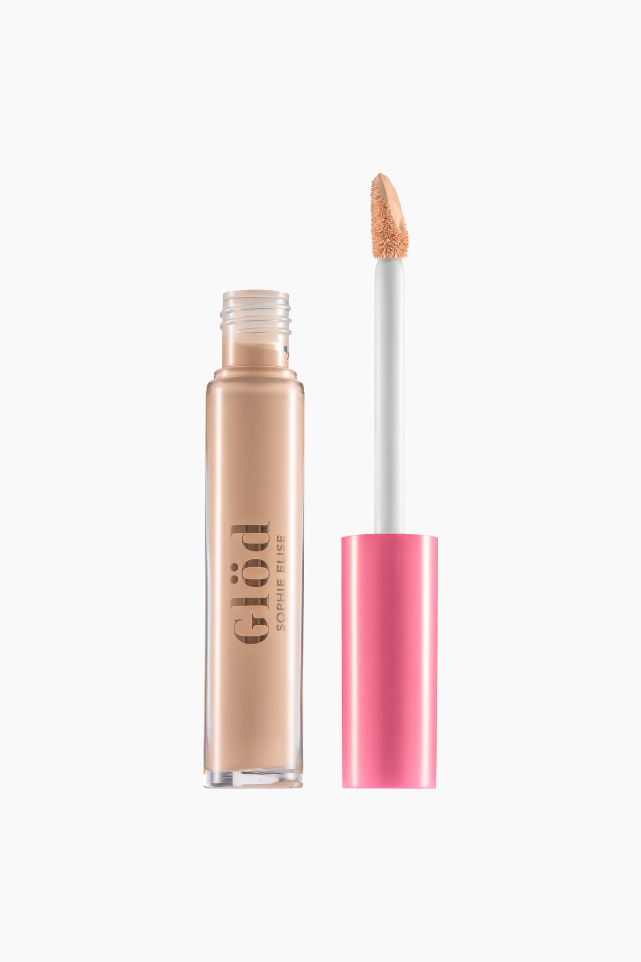 Visa större bild: En flytande concealer står upprätt och visar ett klart cylindriskt hylsa fyllt med en ljusbeige formula och med vertikal guldfärgad branding. Den avskruvade applikatorstaven vilar vertikalt bredvid hylsan och visar ett knallrosa lock samt en doe-foot-applikatorspets täckt av produkten.