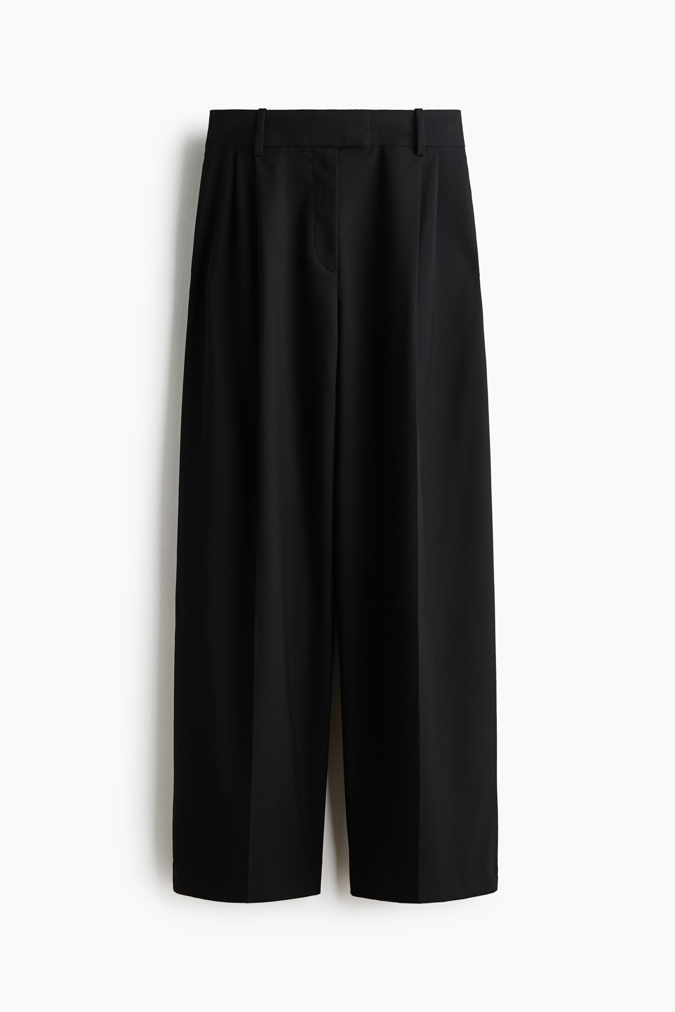 View larger image: Black trousers are shown in a front view, featuring a flat waistband with belt loops and single pleats at the front. They present a wide-leg silhouette with a straight hem.