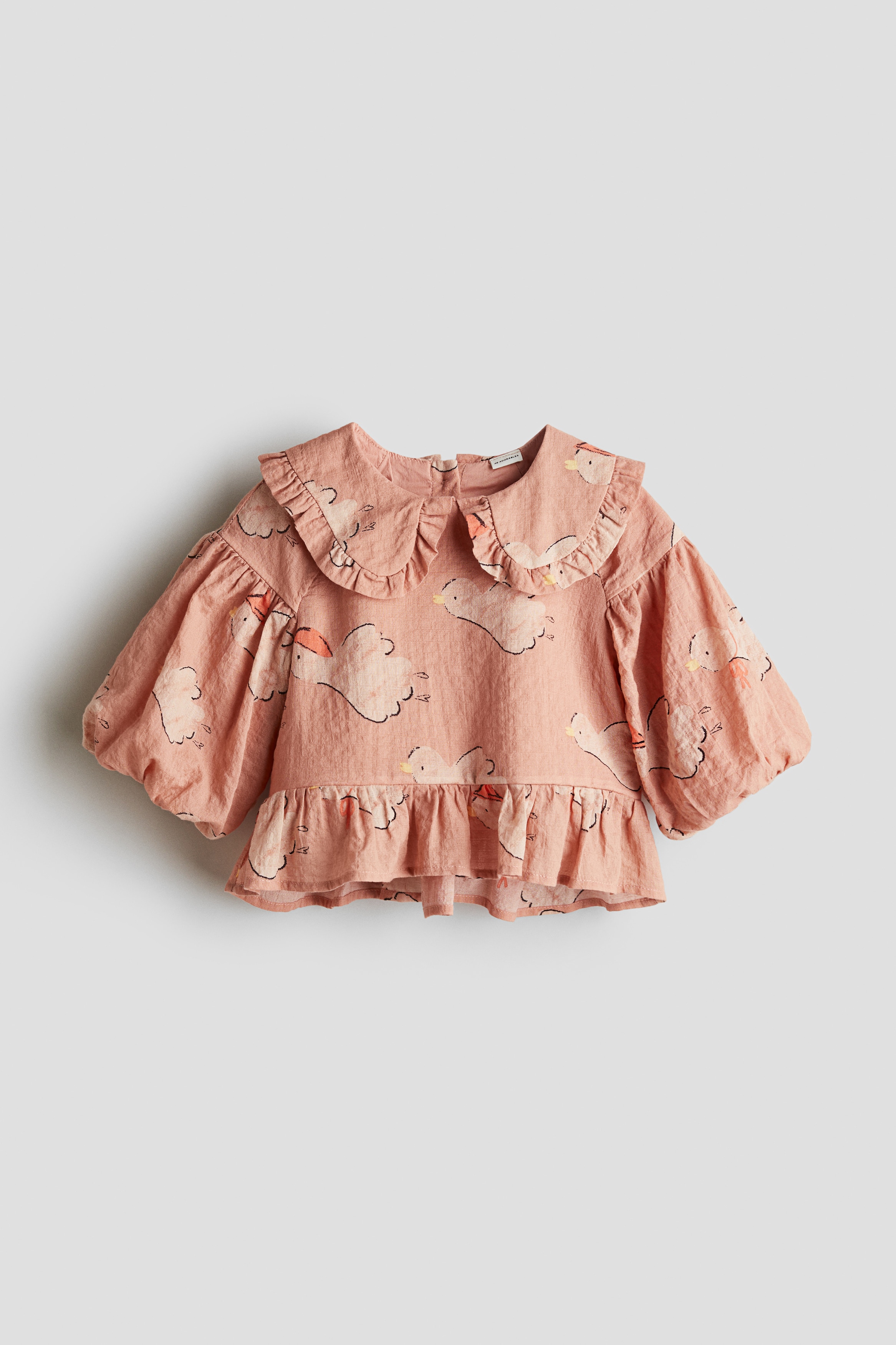 Seersucker-Bluse mit Puffärmeln - Dunkelpfirsich/Vögel/Cremefarben