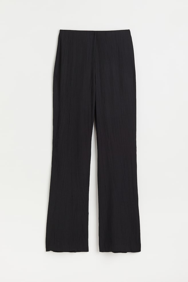 Flared trousers - Black/Light beige/Zebra print