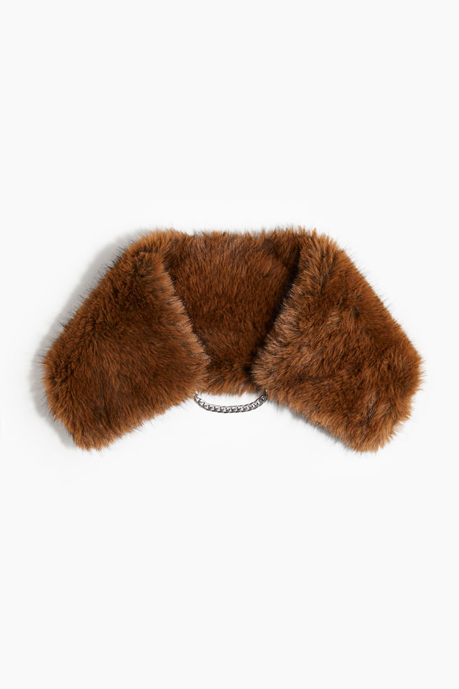 A brown faux fur collar is displaying its front, featuring a silver-toned curb chain at its center. The collar is appearing plush with varying shades of brown. - 1