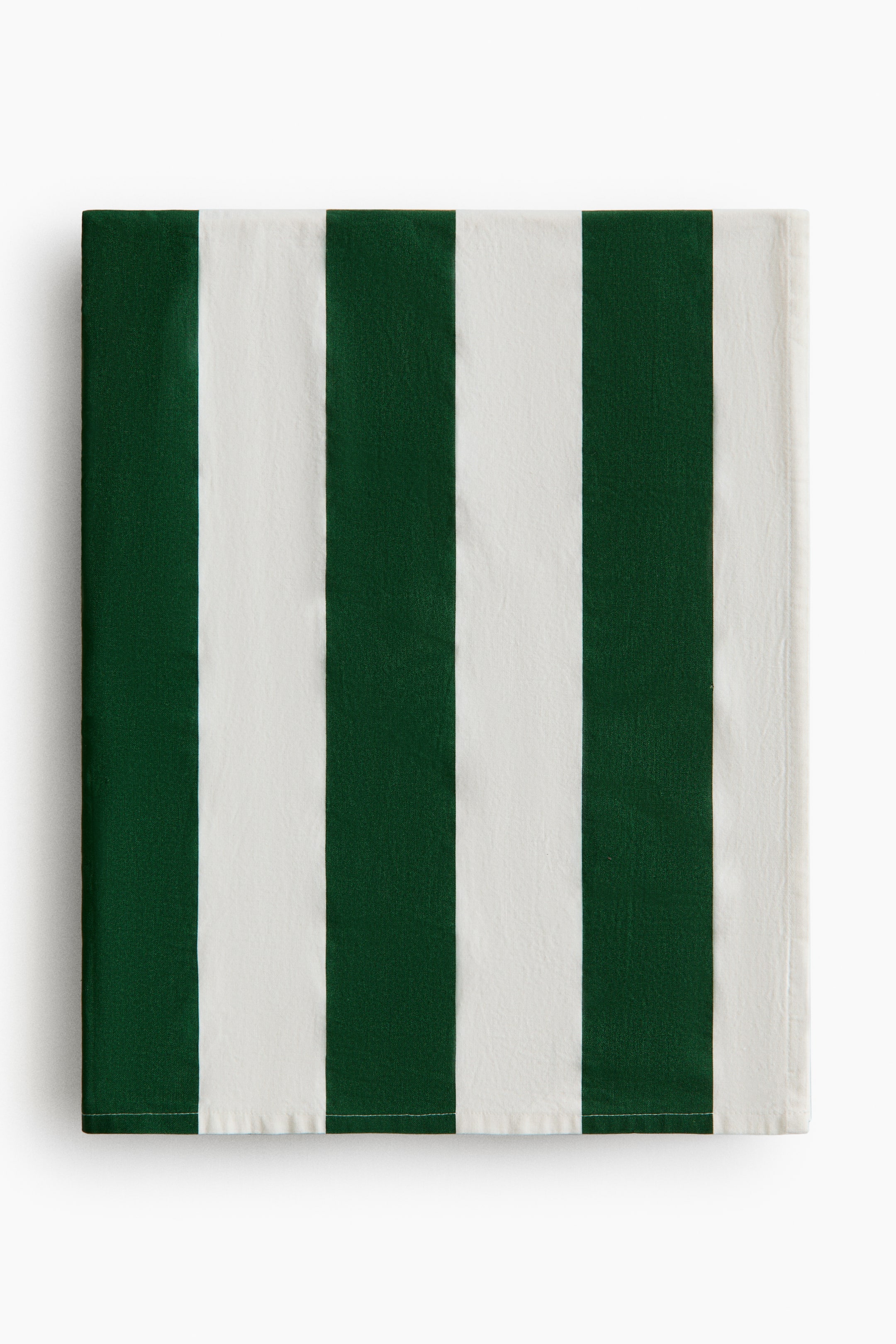 View larger image: A rectangular fabric, viewed from the front, showcases alternating vertical stripes of dark green and off-white. It features finished edges with visible stitching along the bottom.
