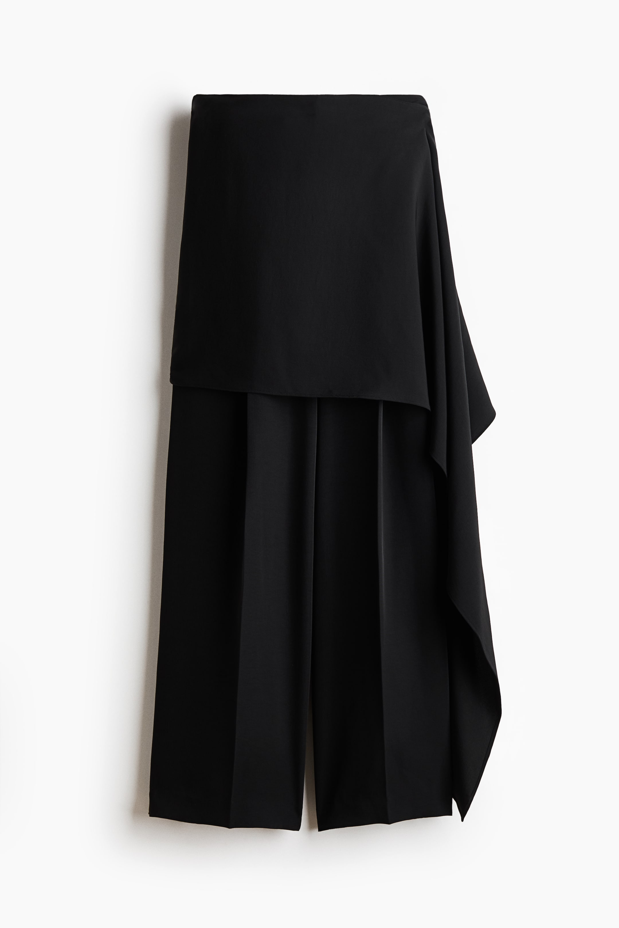 Pantalon chic avec jupe superposée
