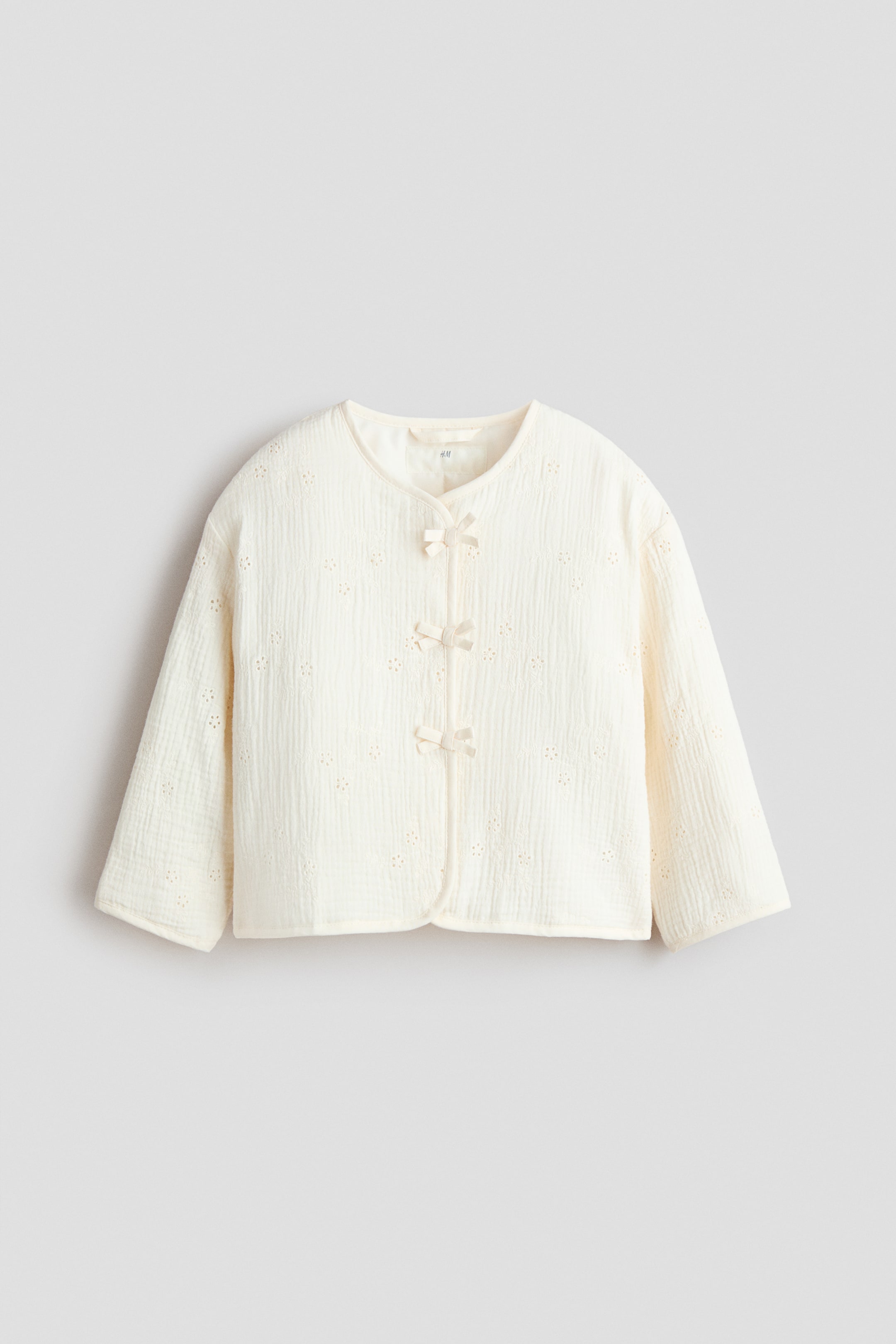 Veste en mousseline avec boucles