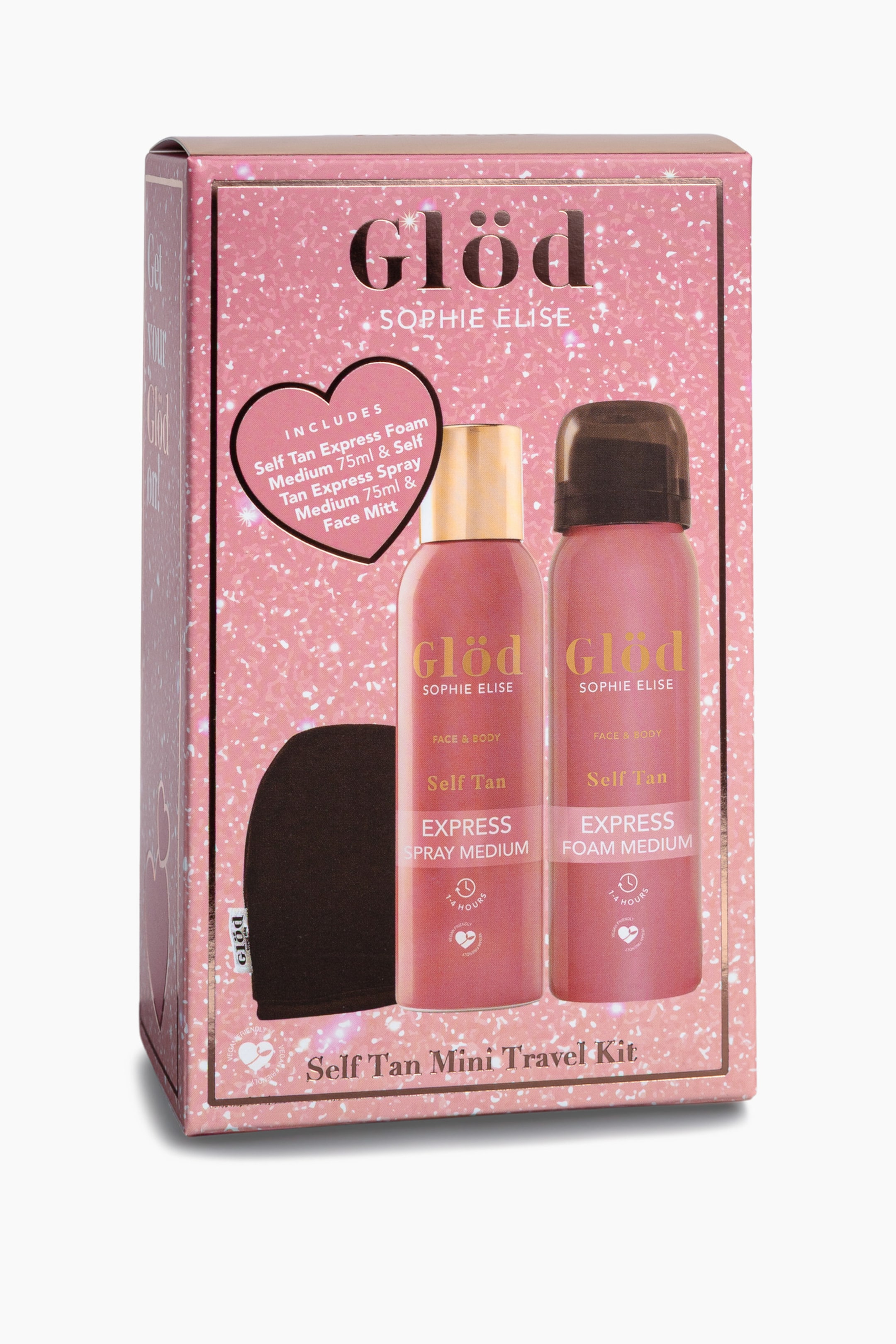Visa större bild: Ett Self Tan Mini Travel Kit står i en trekvarts vinkel och visar sin rosa, glittriga rektangulära förpackning. Framsidan av boxen visar två rosa self-tanning-flaskor – en med guldfärgad kork och en med svart kork – tillsammans med en liten svart appliceringsvante. En rosa hjärtformad grafik listar de medföljande artiklarna under varumärkesprofileringen i guld, "Gl�d Sophie Elise".