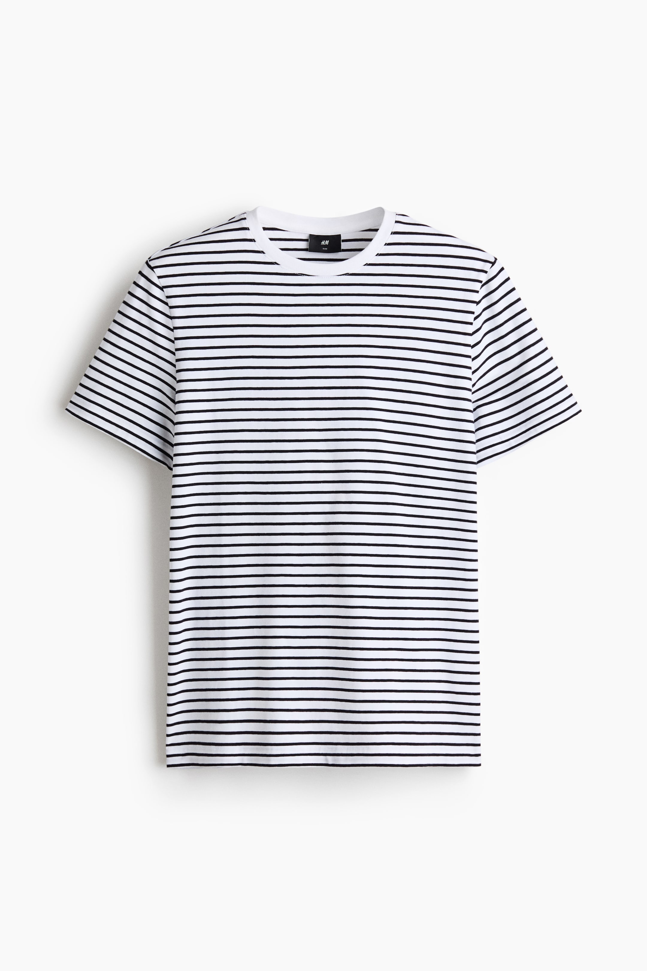View larger image: The T-shirt is shown from the front, featuring a white base with horizontal black stripes, a round, rib-trimmed neckline and short sleeves. It has a straight-cut hem and a slim fit.