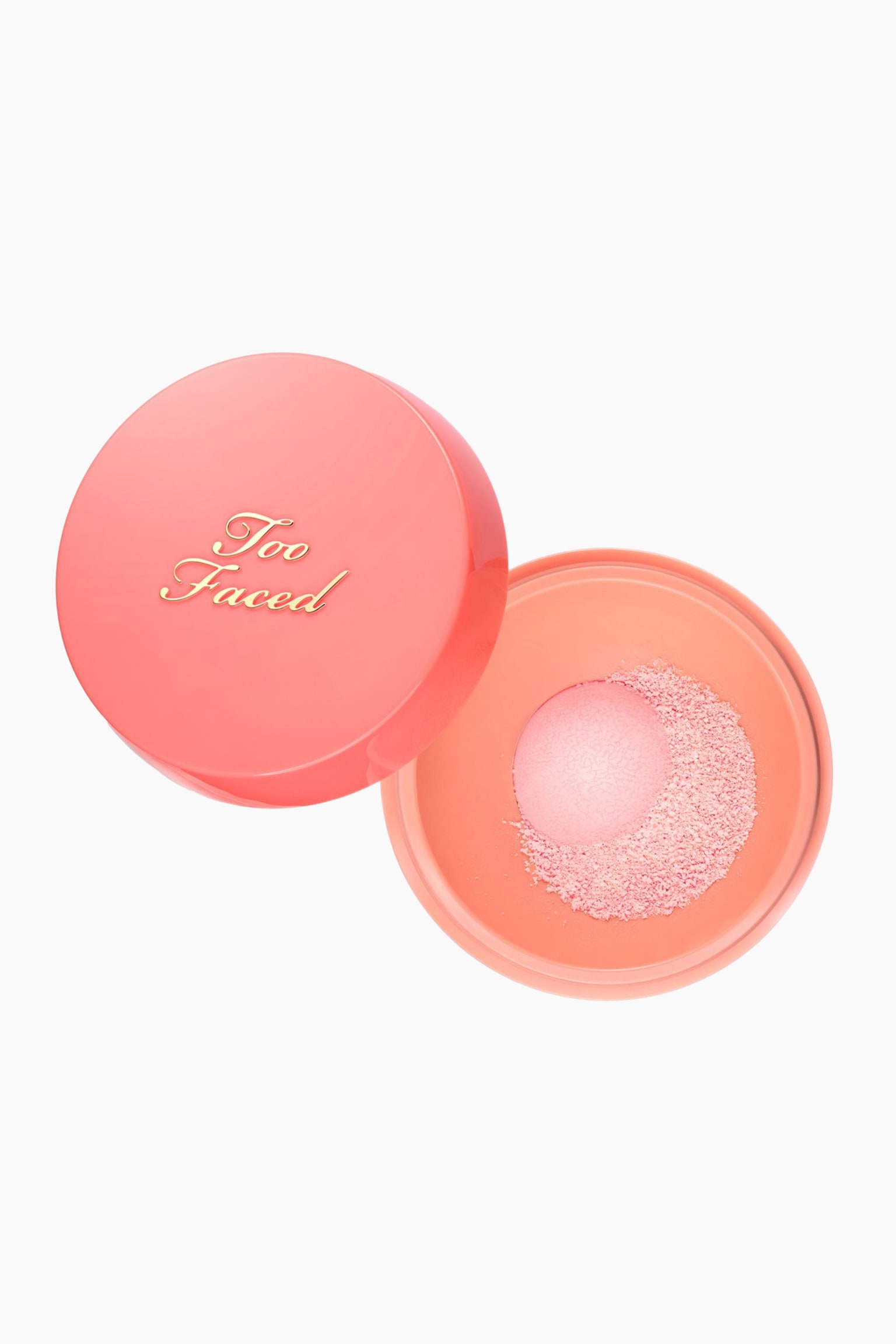 The Peach Perfector Blurring Loose Setting Powder ligger Ã¶ppet i en uppifrÃ¥nvy och visar en rund persikofÃ¤rgad behÃ¥llare bredvid sitt avtagna glansiga lock. BehÃ¥llaren rymmer ljusrosa lÃ¶spuder runt en central dispenser med nÃ¤tkupol, medan locket visar den guldbestÃ¤mplade varumÃ¤rkeslogotypen "Too Faced."