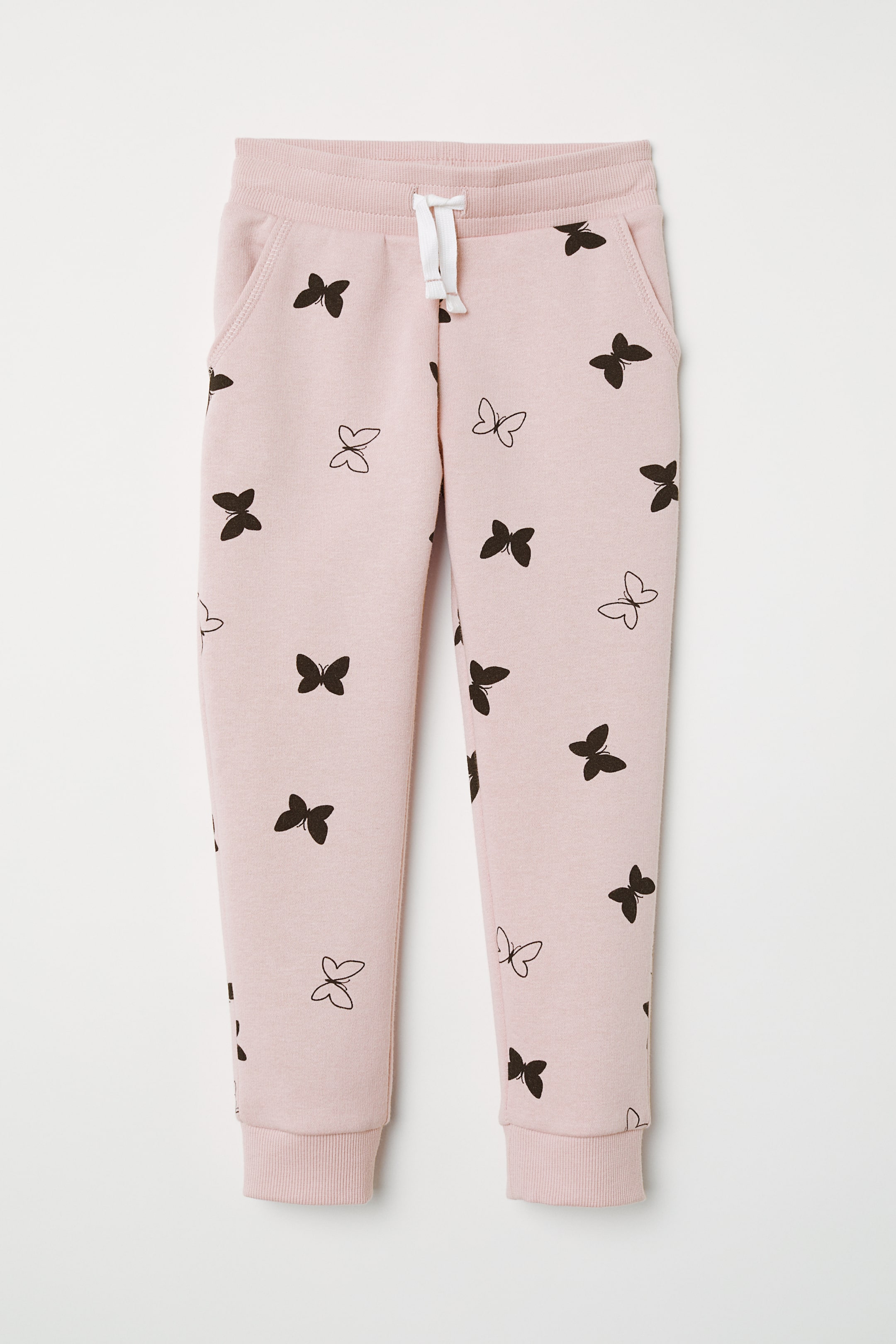 Zobrazit větší obrázek: Kalhoty jogger - Pudrově růžová/motýli - DĚTI | H&M CZ 1