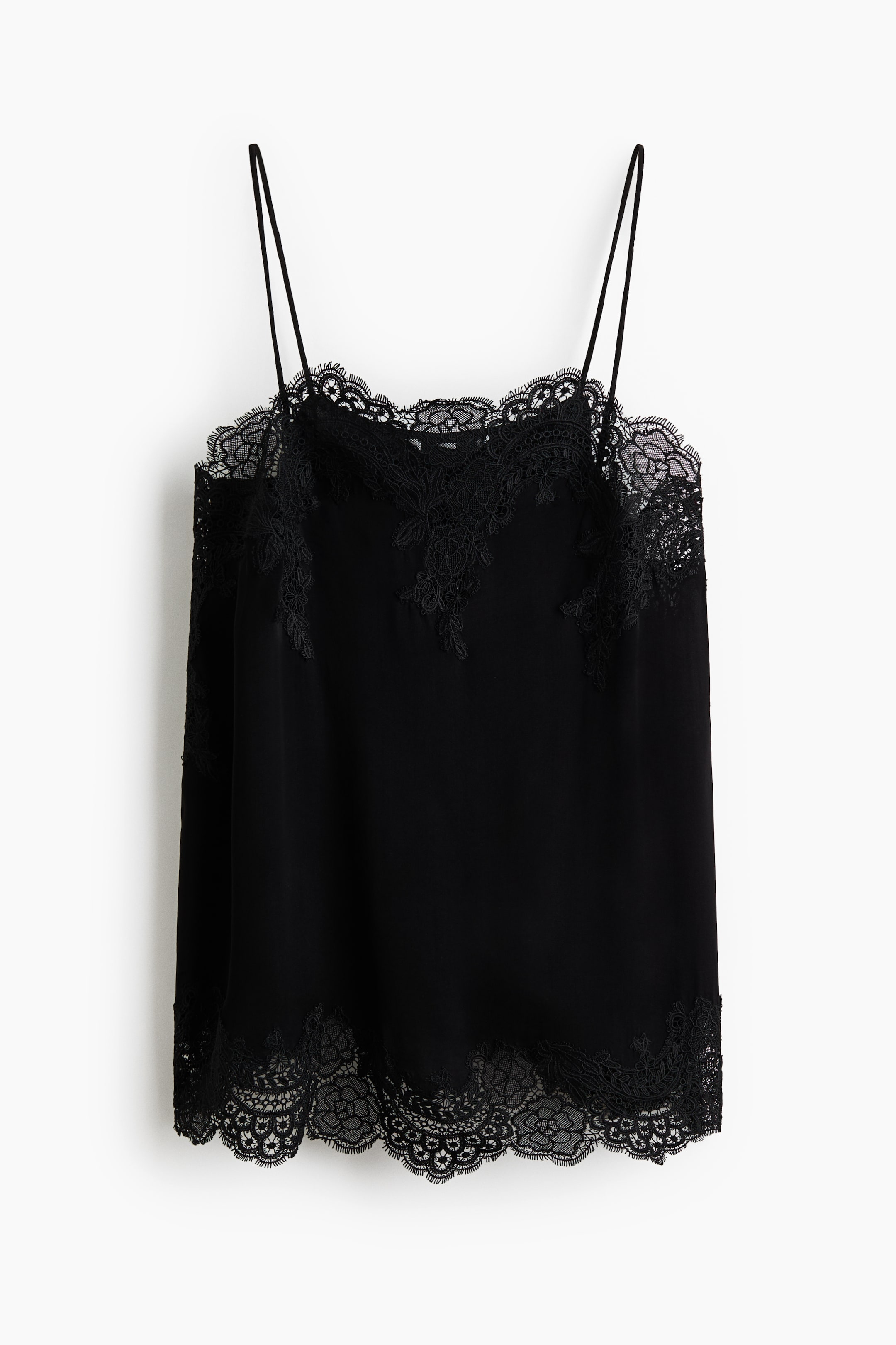 Voir une image plus grande: Un haut camisole noir est présenté de face, avec des bretelles fines en spaghetti et un tissu lisse pour le corps. Il met en valeur une bordure en dentelle festonnée le long de l'encolure et de l'ourlet, avec des appliqués en dentelle florale supplémentaires décorant le haut du buste.