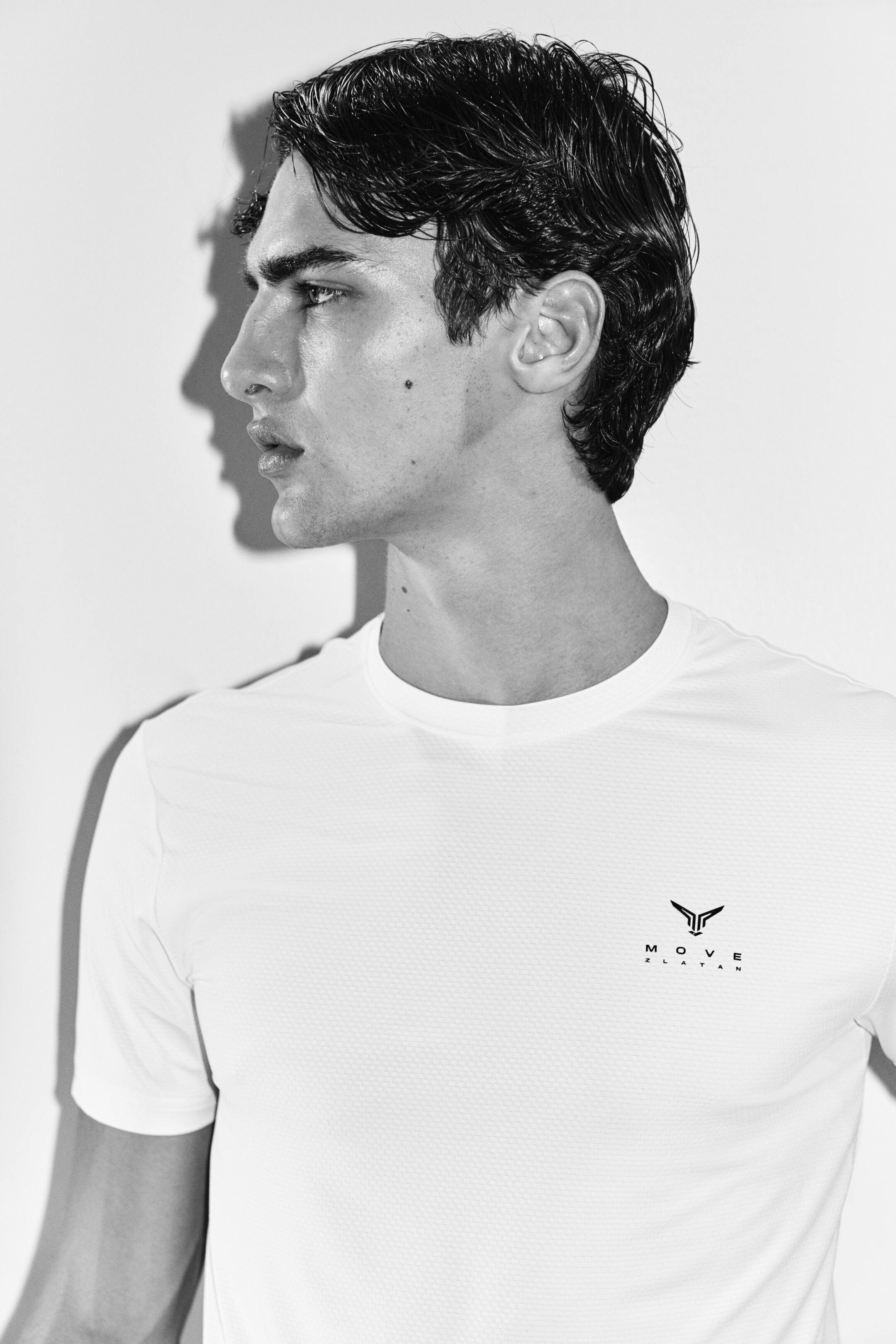 View larger image: Muscle Fit Sports T-shirt with DryMove™ - Cream/Move Zlatan - Men | H&M IN 5