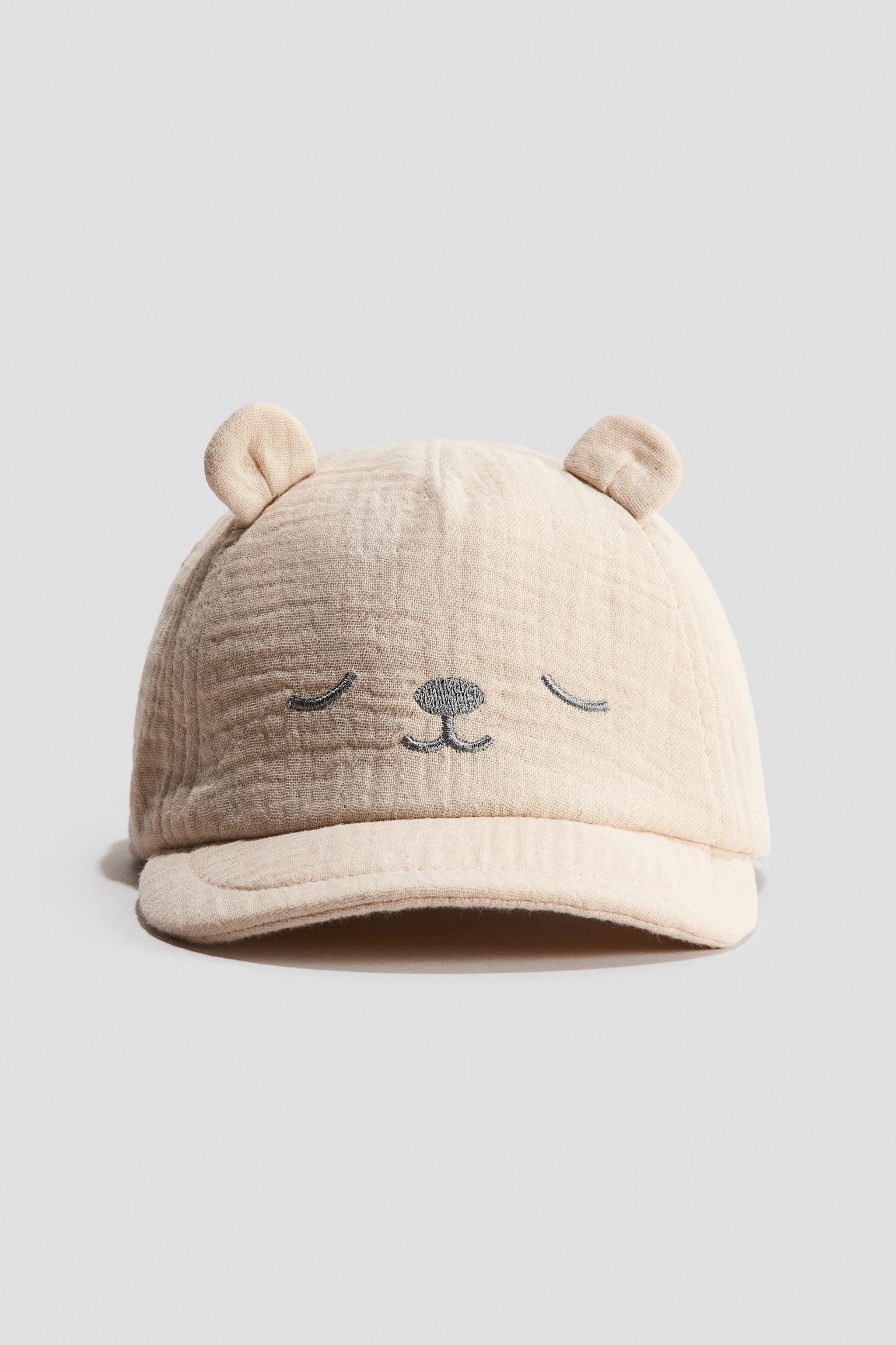 Soft-peak muslin cap - Light beige/Bear