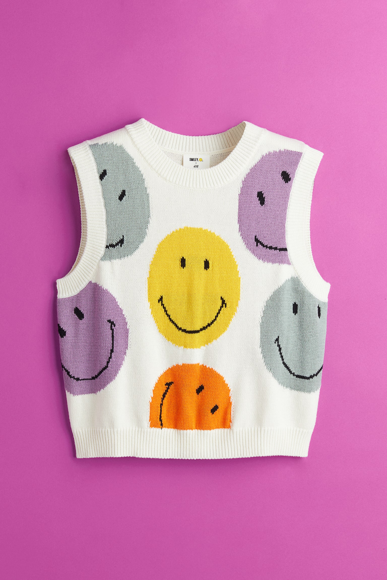 H&M+ Pull sans manches en maille jacquard - Crème/Smiley®