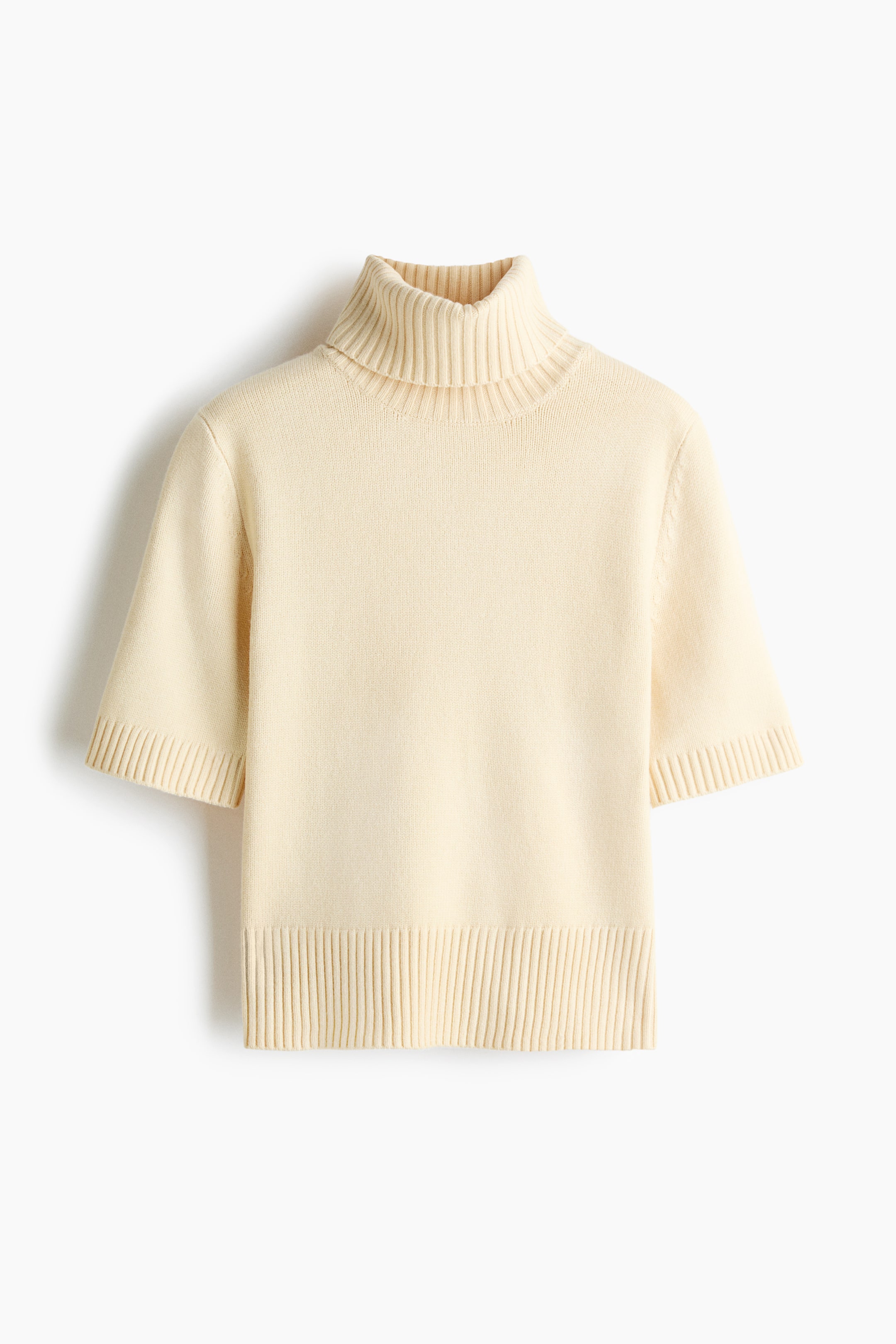 View larger image: A cream-coloured short-sleeved turtleneck sweater is shown from the front. It features a ribbed turtleneck collar, short sleeves with ribbed cuffs, and a ribbed hem.
