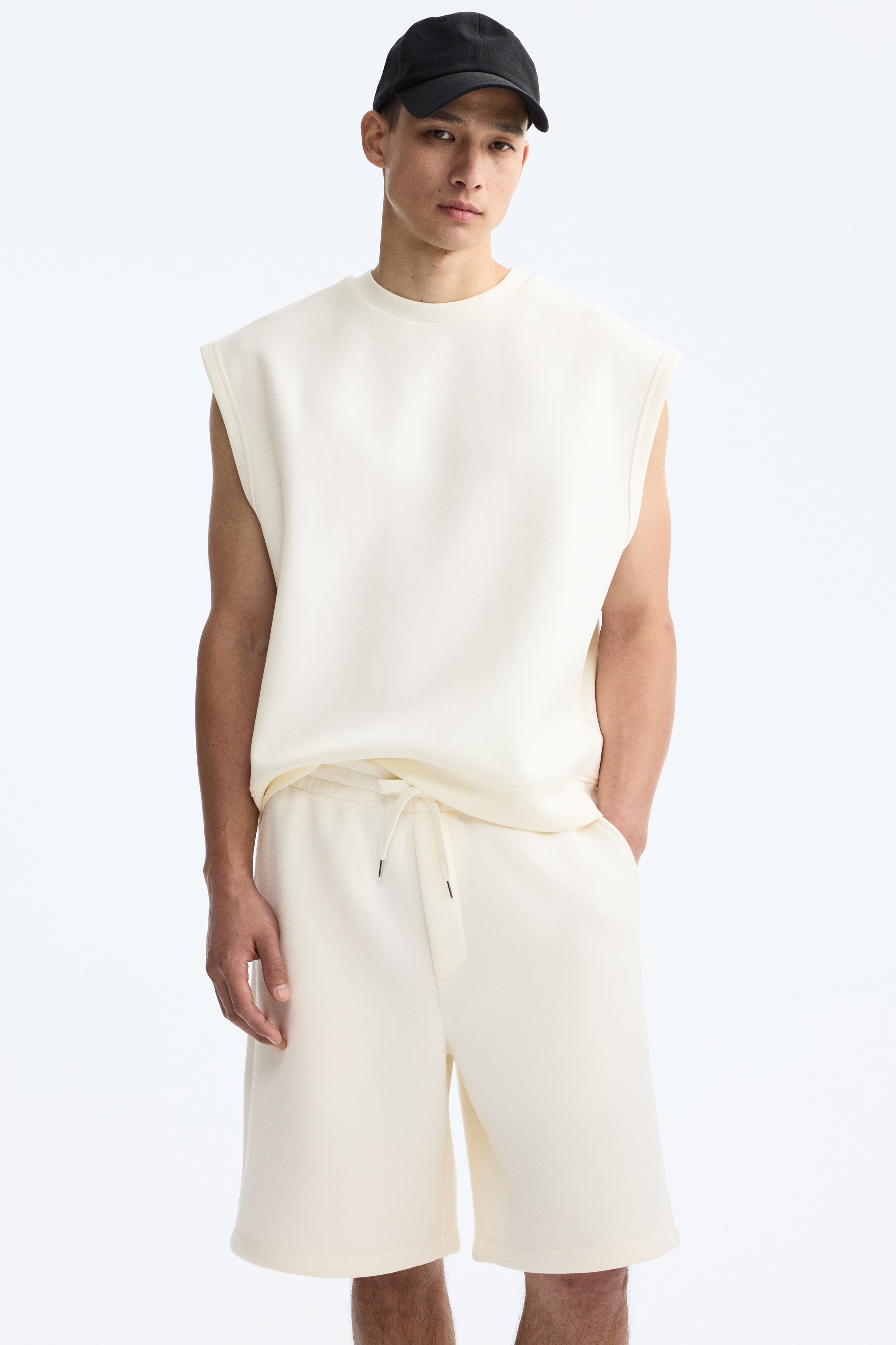 smocked white dress The Evette White Zip Front Midi Dress