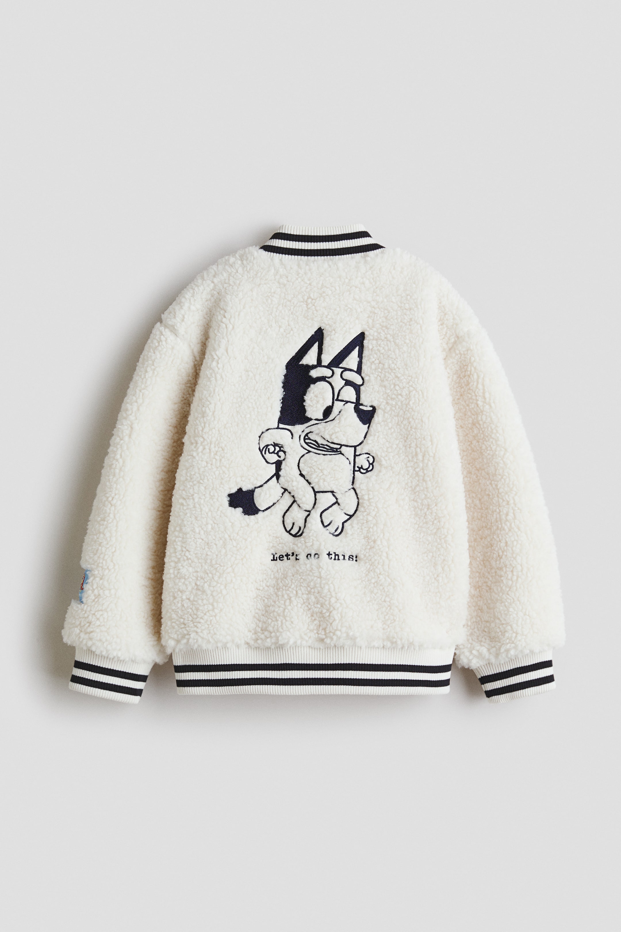 Ampliar la imagen: Teddy baseball jacket - Crema/Bluey - Kids | H&M MX 2