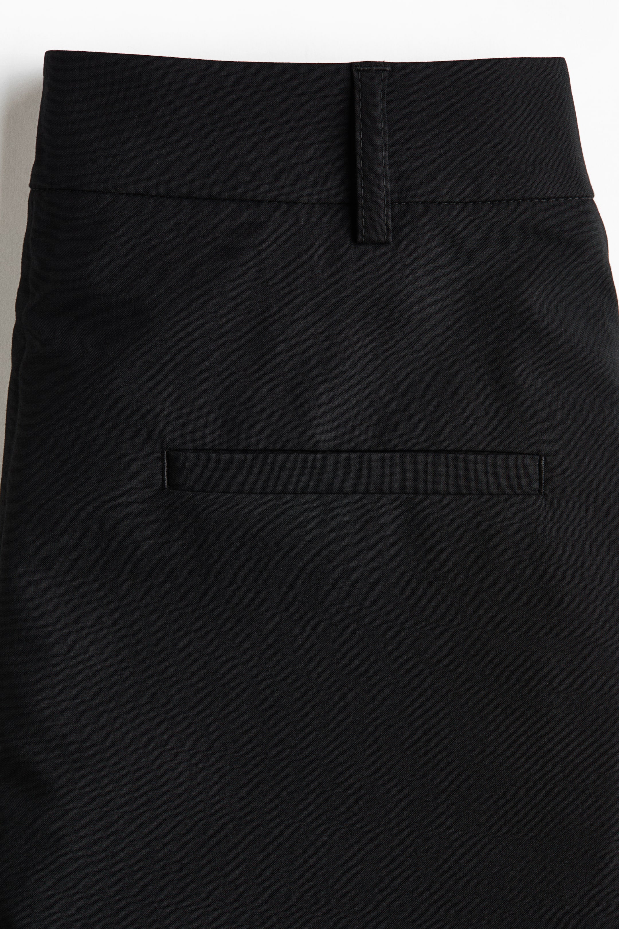 Pantalon droit avec jupe superposée