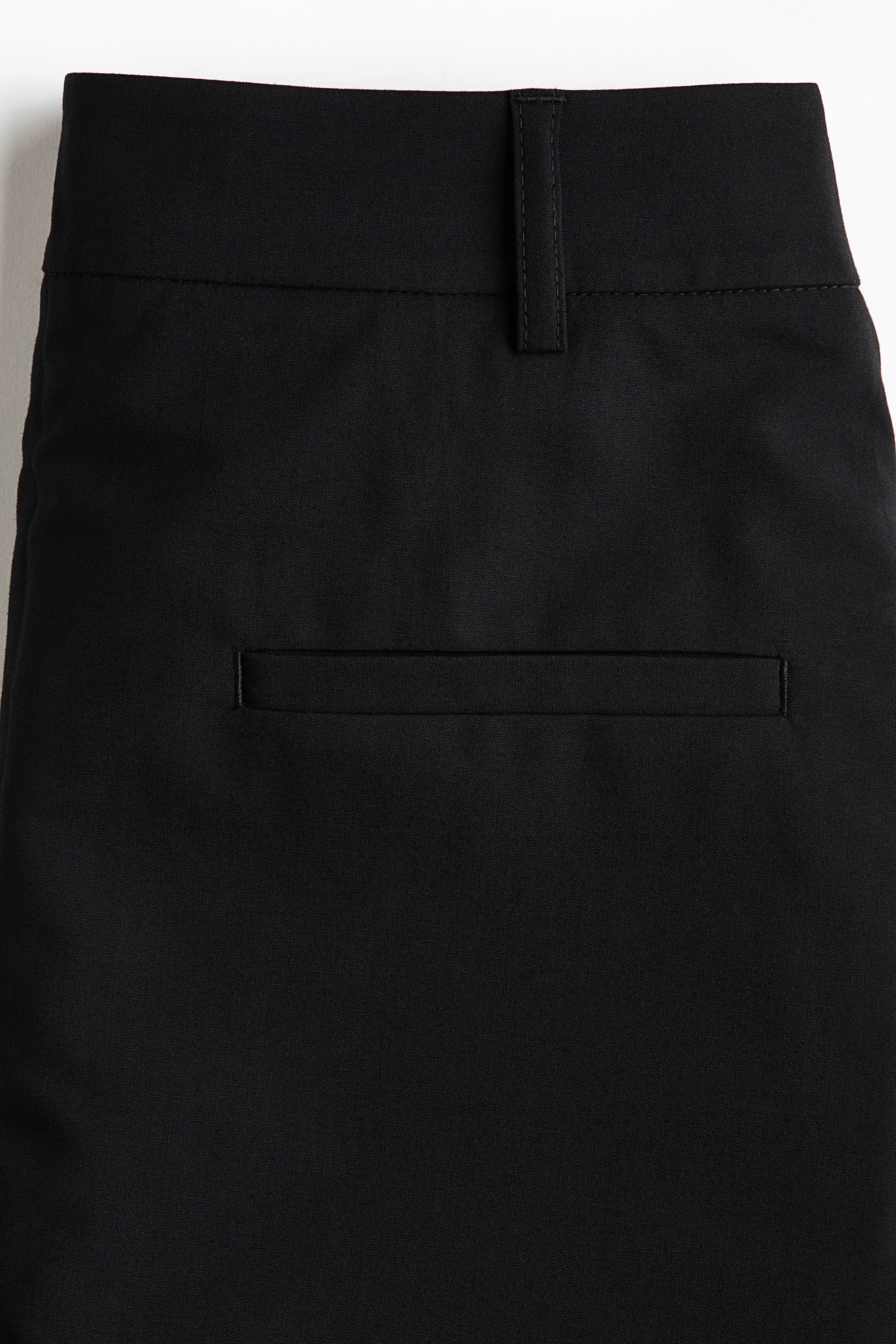Pantalon droit avec jupe superposée